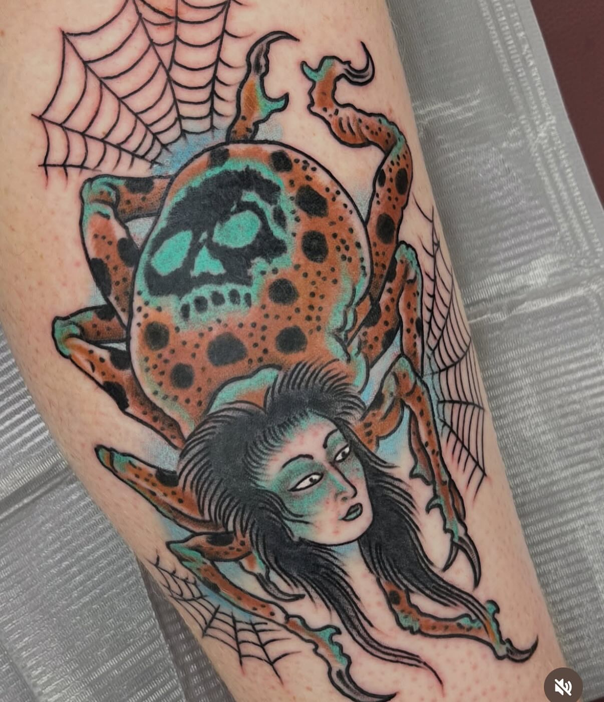 Skull and octopus American traditional tattoo on the forearm by Steve Tiberi
