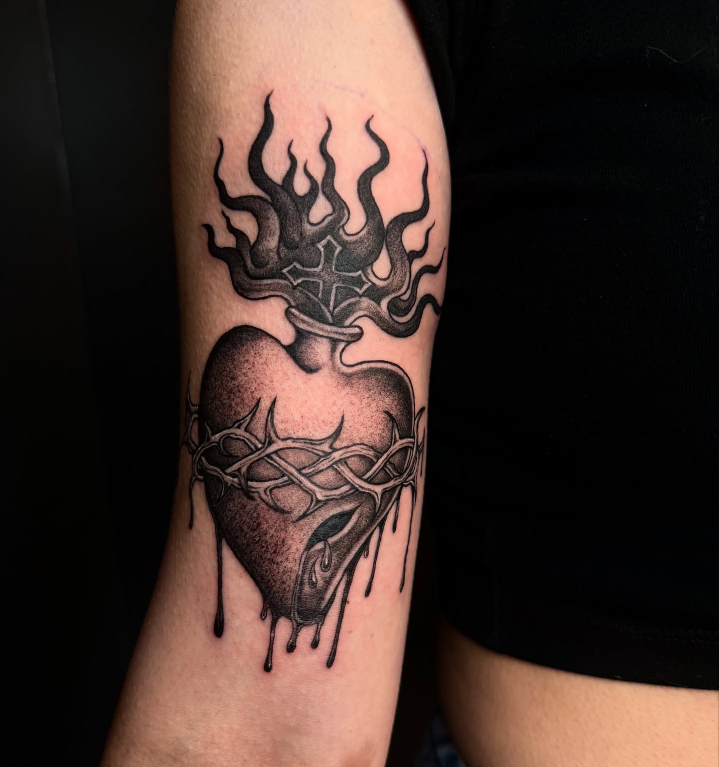 Heart with thorns dotwork tattoo on the forearm by dinah