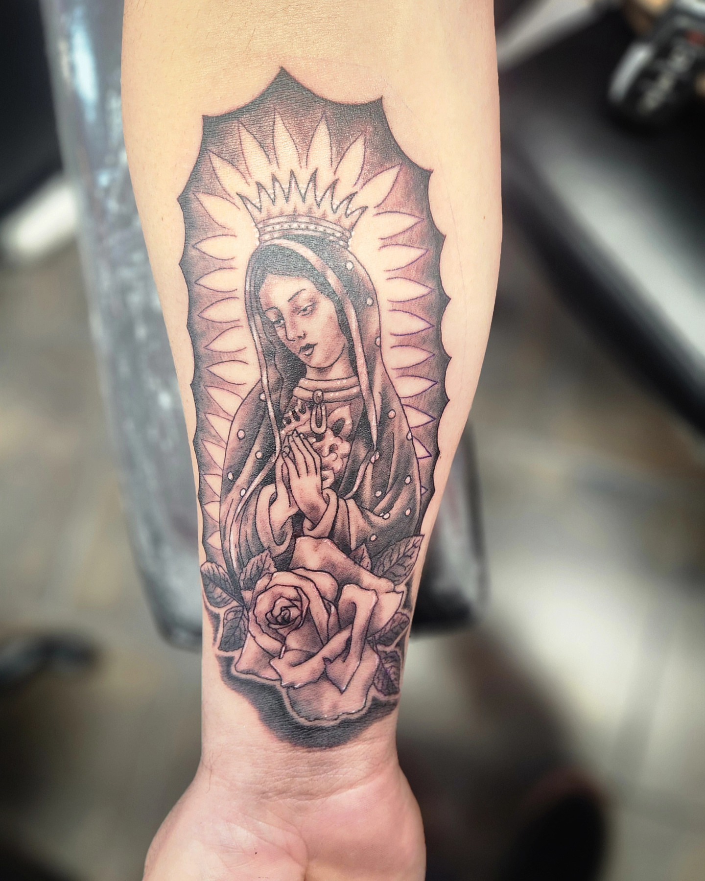 Our Lady of Guadalupe black and grey tattoo on the forearm by Samantha Von Zombia, Saint Paul, Minnesota