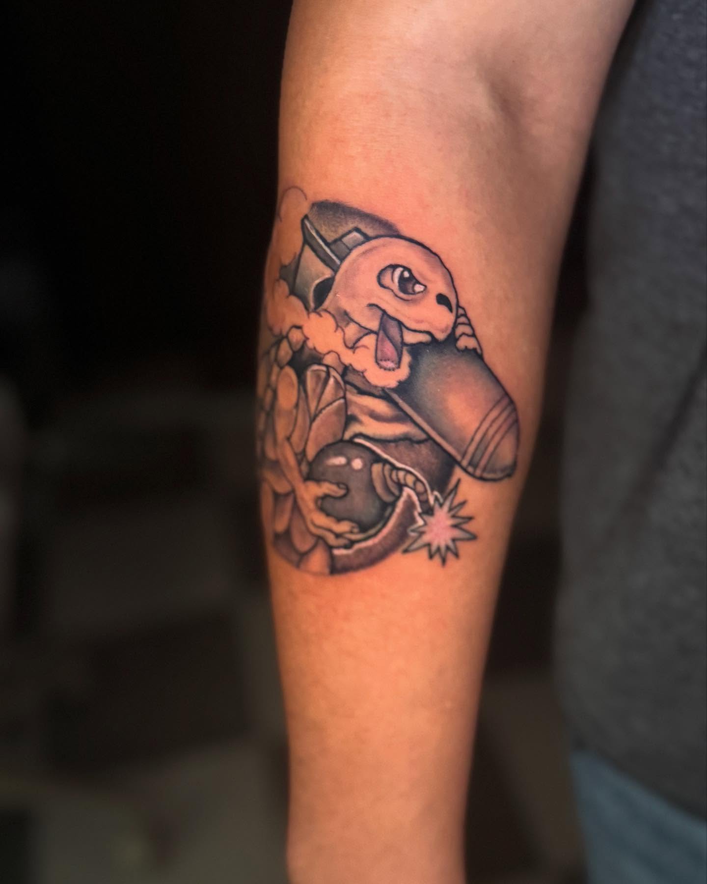 Turtle with grenade black and grey tattoo on the forearm by Brandon Seven