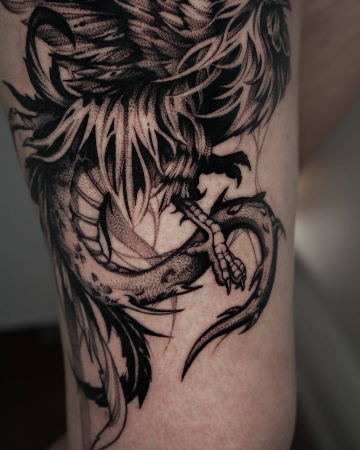Dragon black and grey tattoo on the forearm by Bruna Bianculli