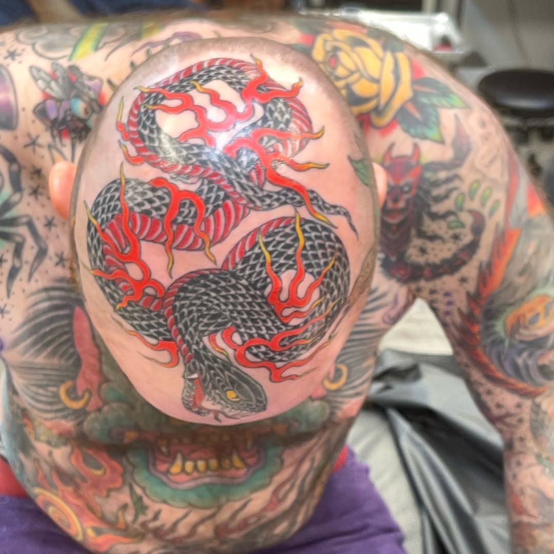 Snake and flames American traditional tattoo on the torso by Mister Joe Joe Frisco Tattoo, San Francisco, California