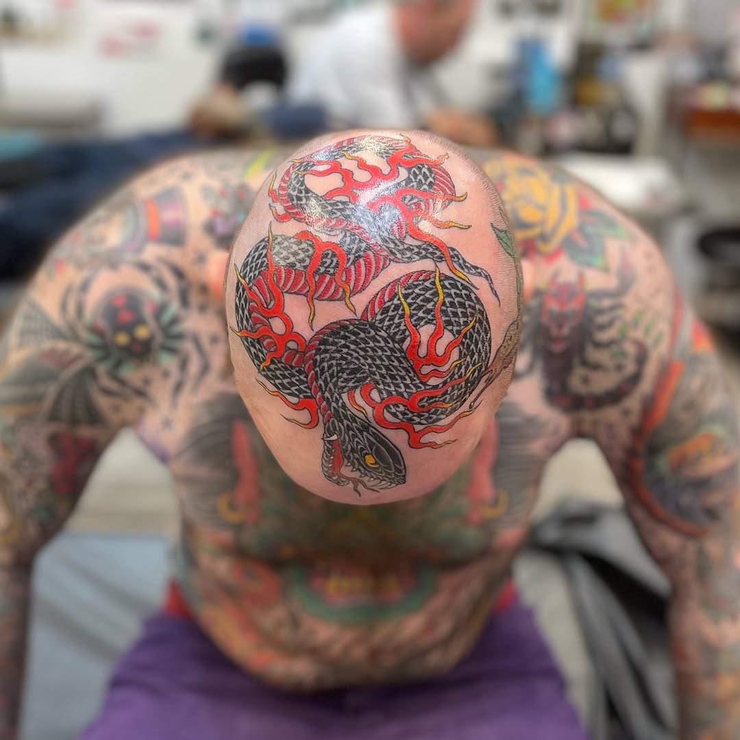 Snake and flames Japanese tattoo on the head by Mister Joe Joe Frisco Tattoo, San Francisco, California