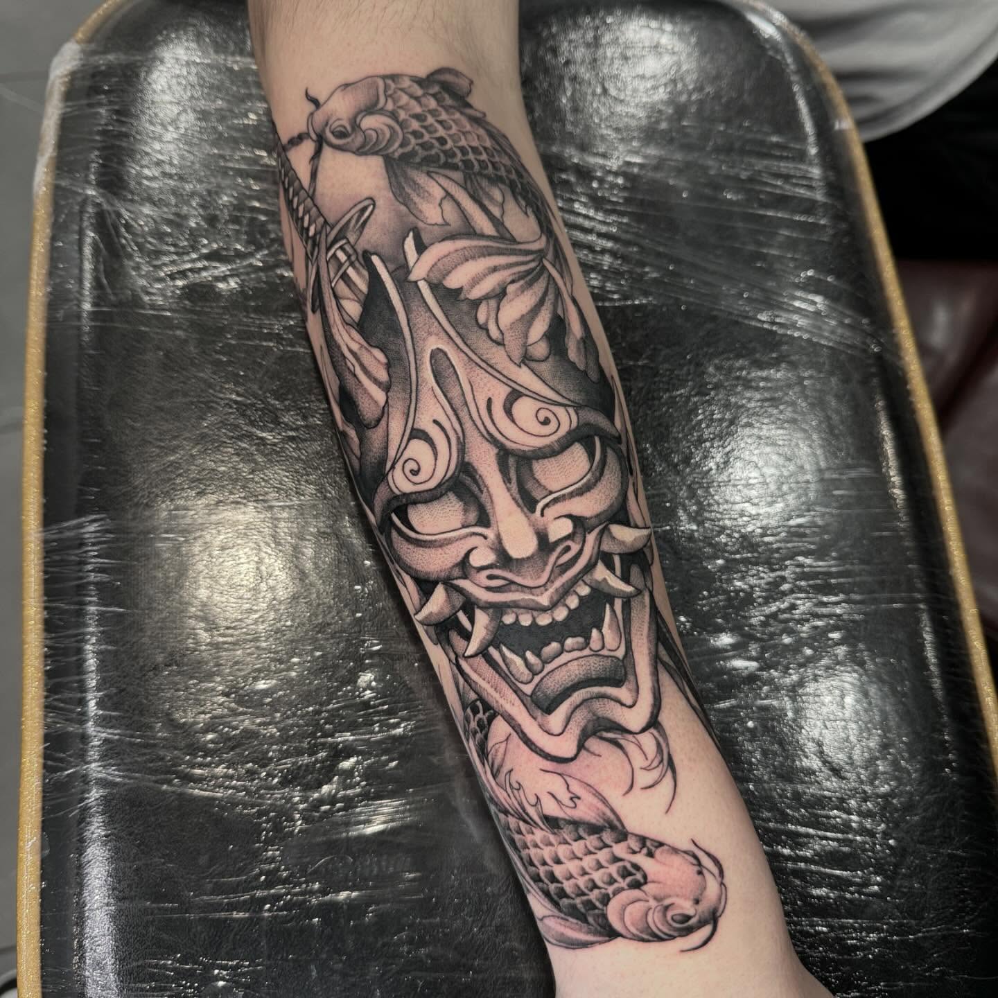 Mask japanese irezumi tattoo on the forearm by Ryan Futterman