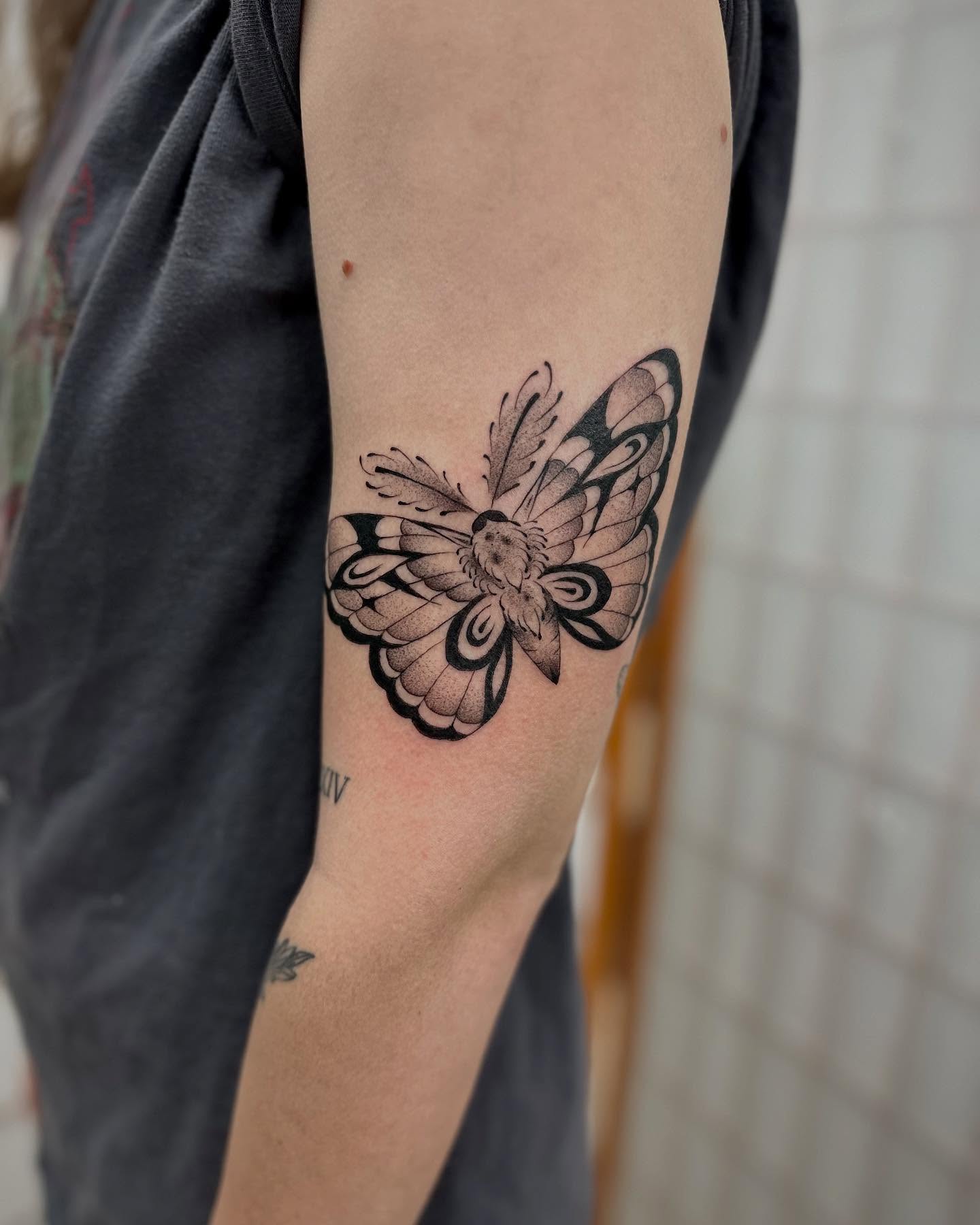 Butterfly dotwork tattoo on the forearm by christian martinez