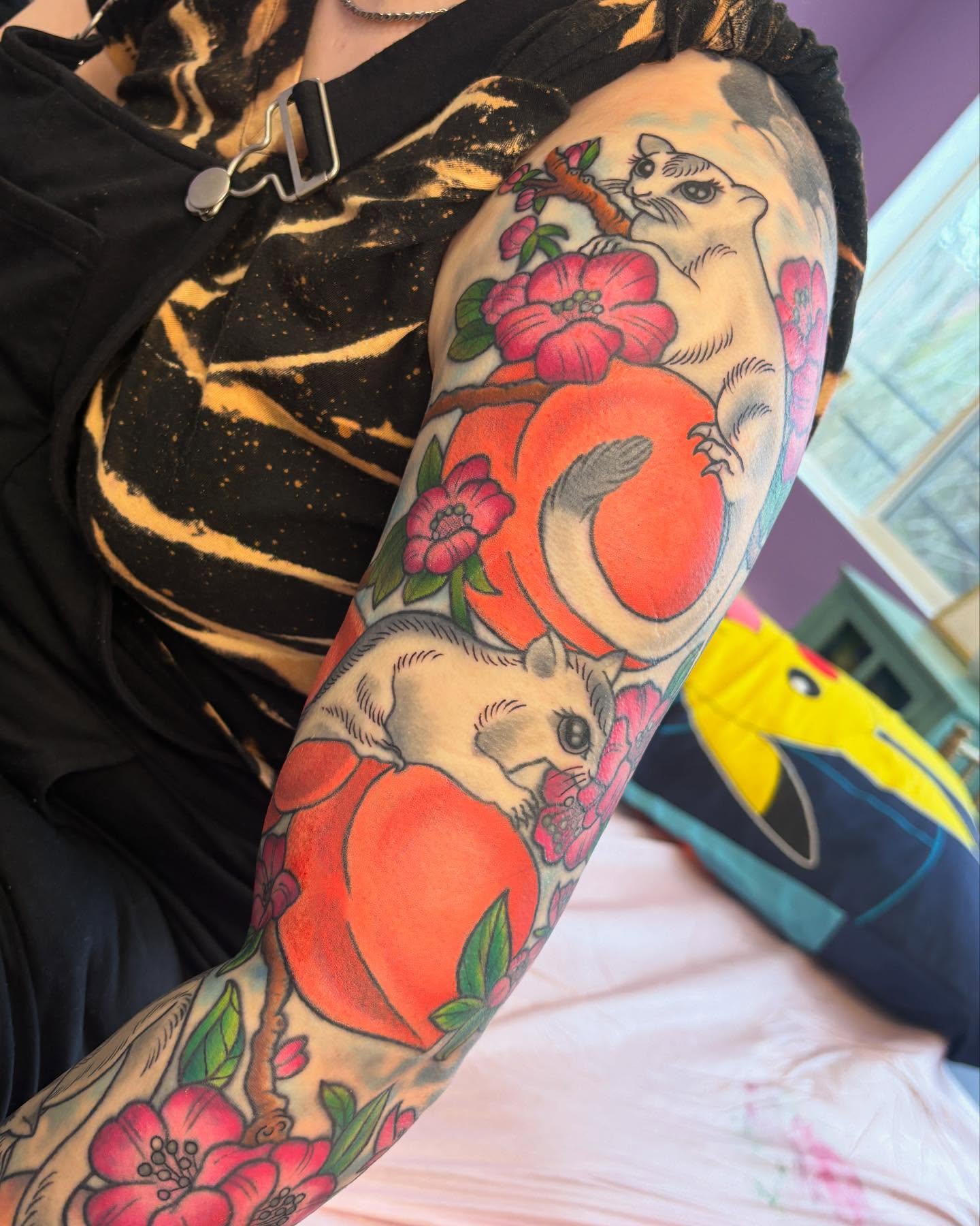 Peach and squirrel new school tattoo on the upper arm by ♥ Brynn Allyn ♥