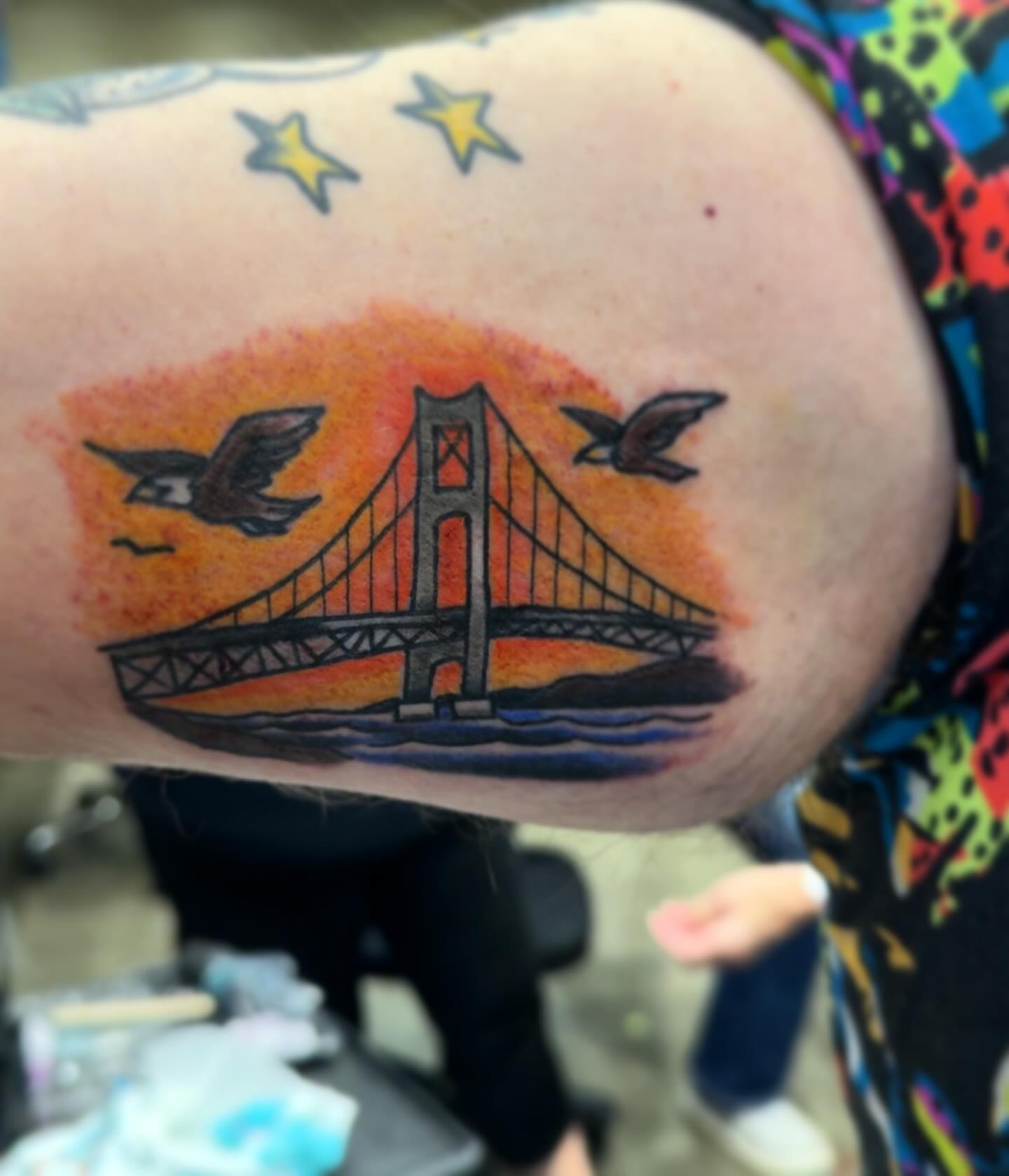 Golden gate bridge American traditional tattoo on the forearm by Robbie Roberson