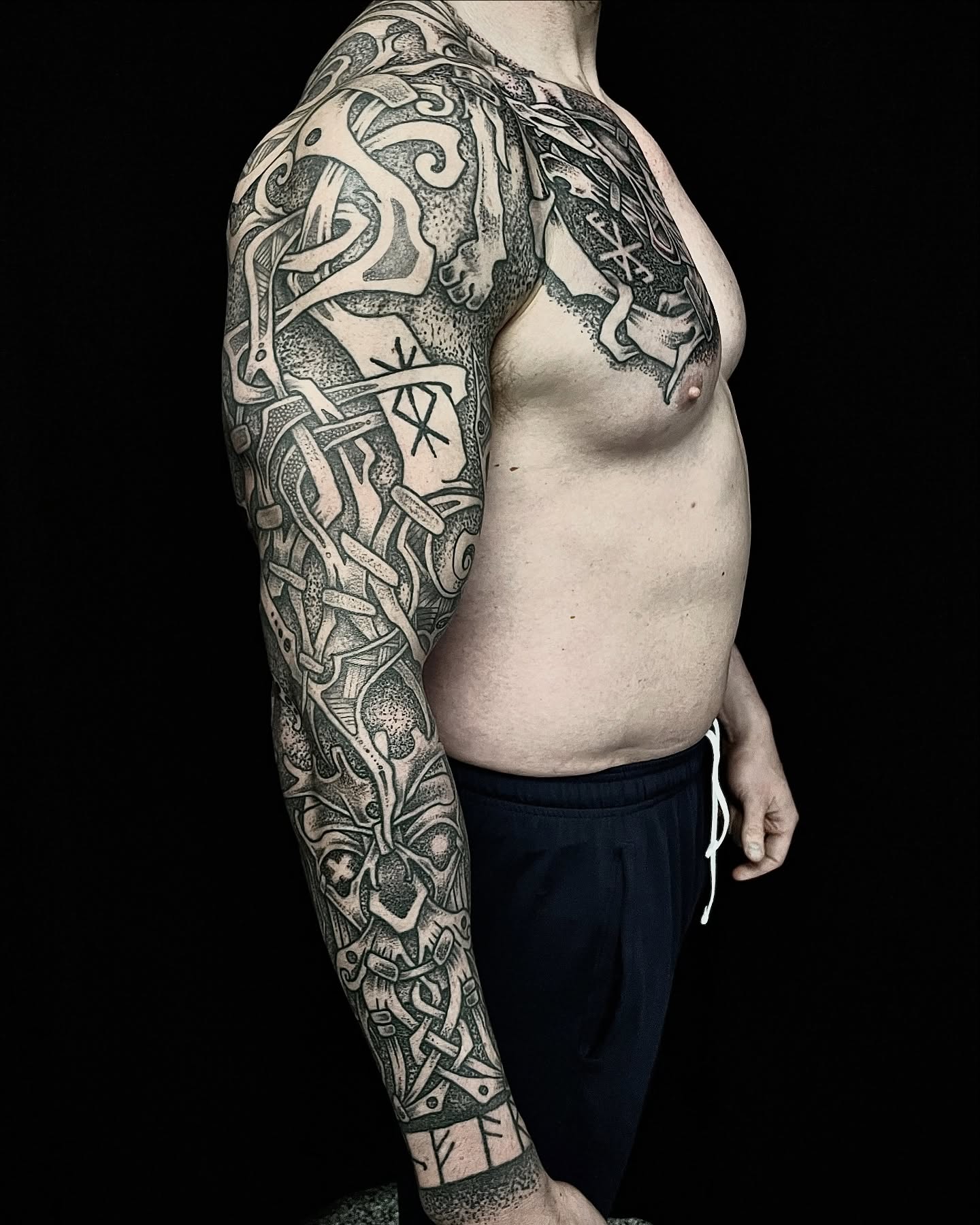 Viking warrior dotwork tattoo on the upper arm by Will McCoy (Tattooist), Murray, Utah