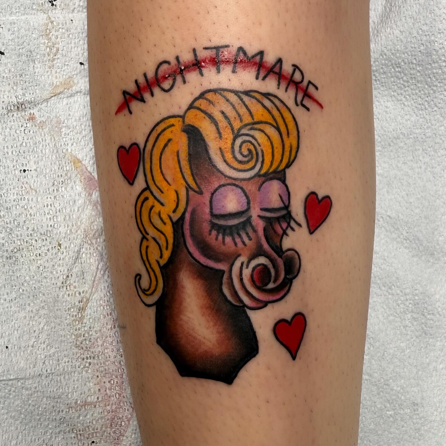 Woman with spiral hair American traditional tattoo on the forearm by Jacie Aasen-Lupino