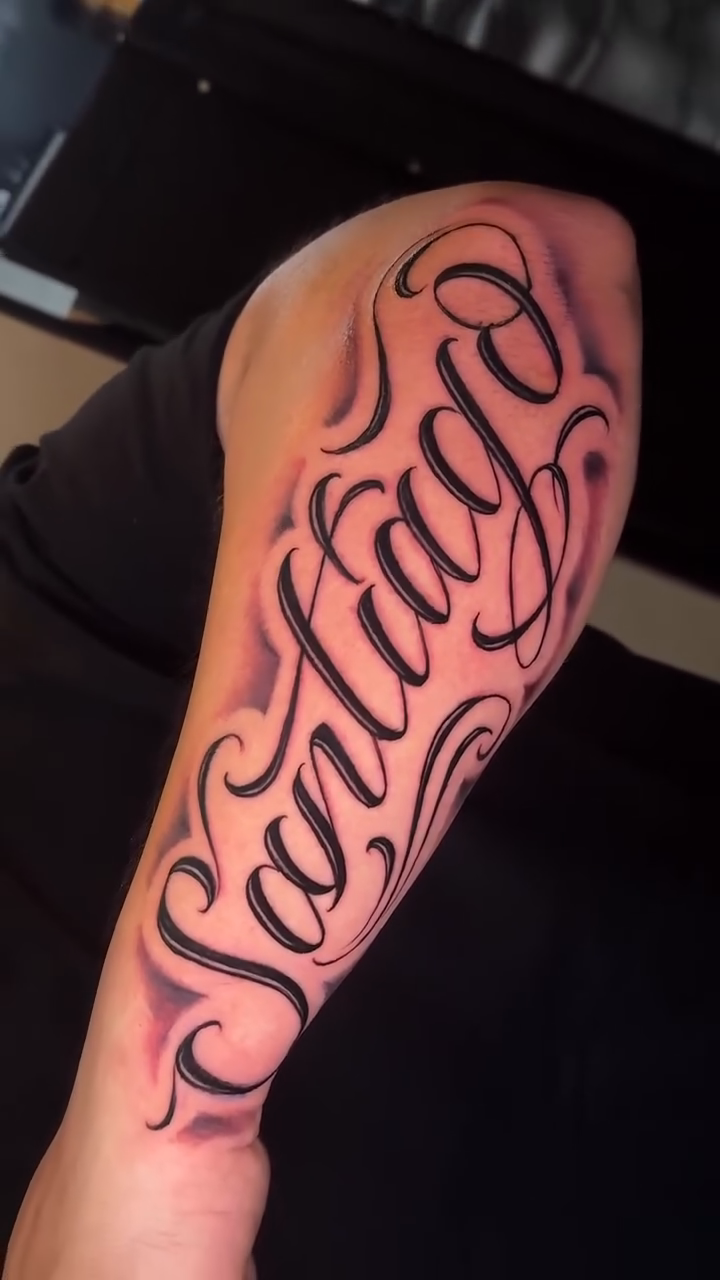 Santiago lettering script tattoo by WestHustleArt