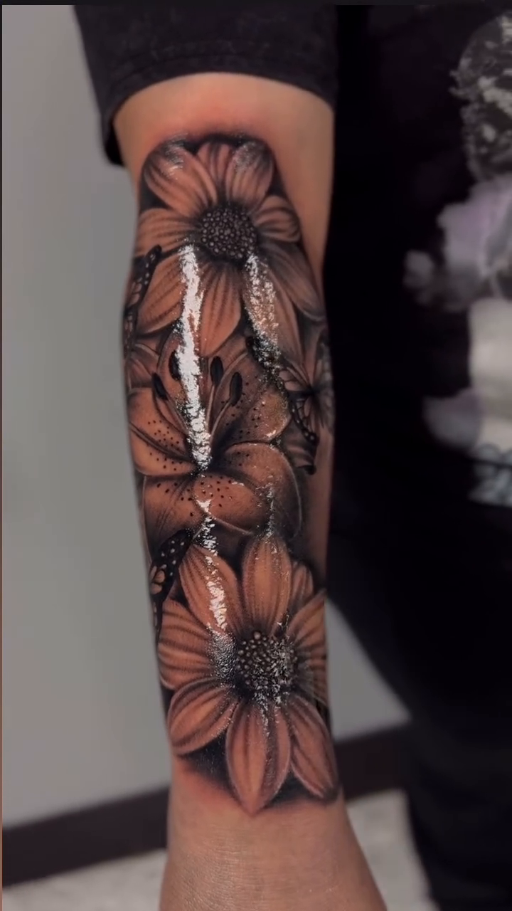 Sunflowers realism tattoo by Alex Romero