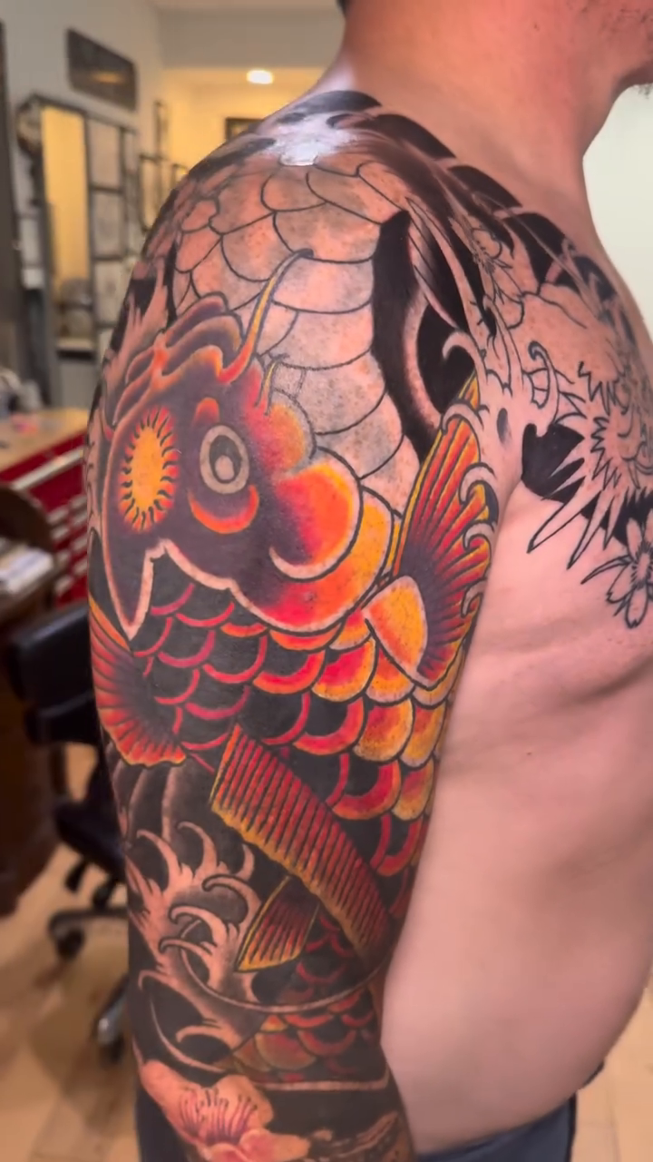 Koi fish and Daruma doll sleeve japanese irezumi tattoo by David Gray