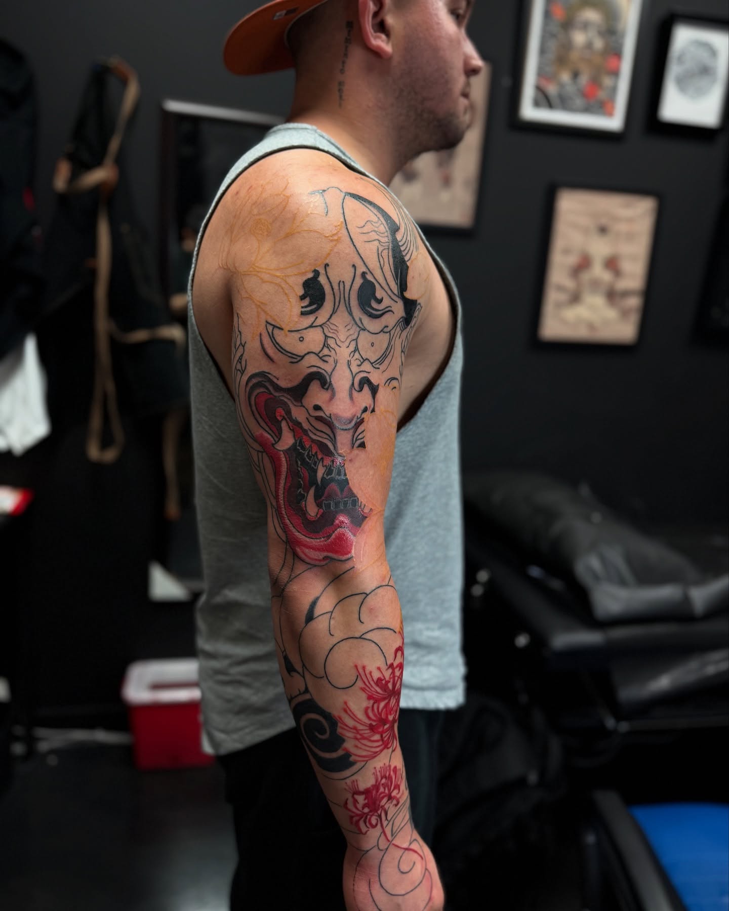 Demon mask japanese irezumi tattoo on the upper arm by Zack Yang, Houston, Texas