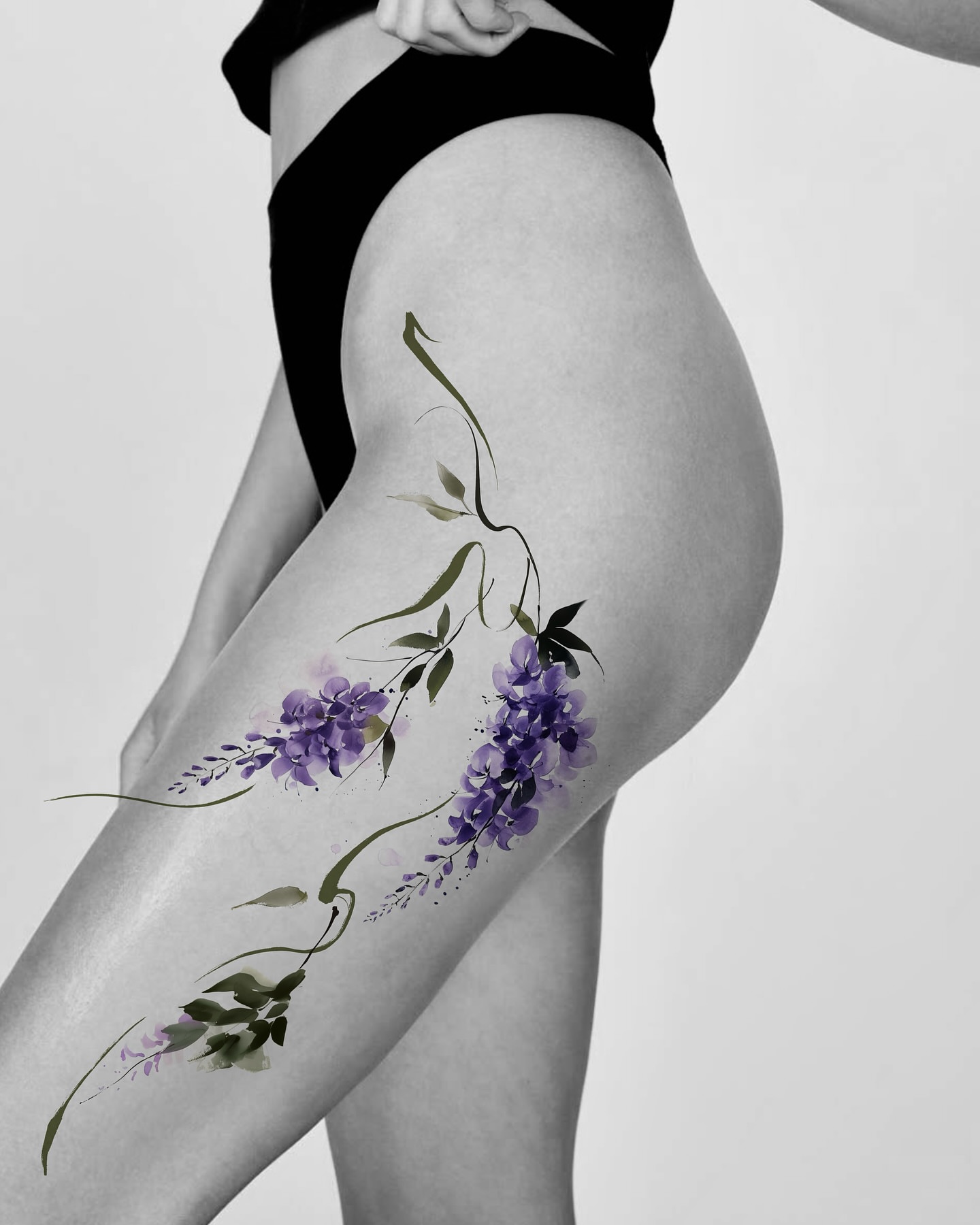 Wisteria flowers watercolor tattoo on the thigh by Sylvia｜思岐, Vancouver, British Columbia