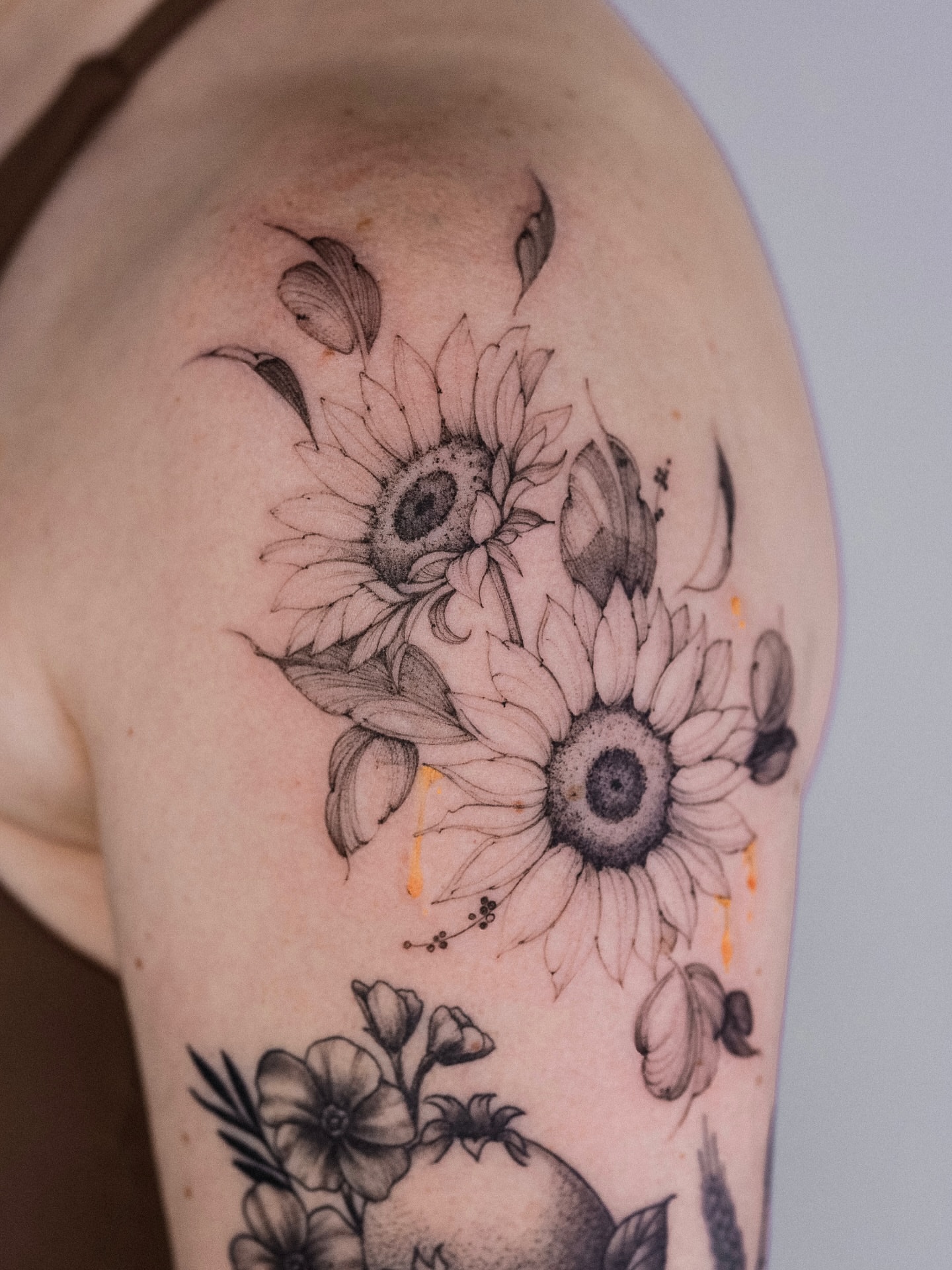 Sunflowers dotwork tattoo on the shoulder by Maria