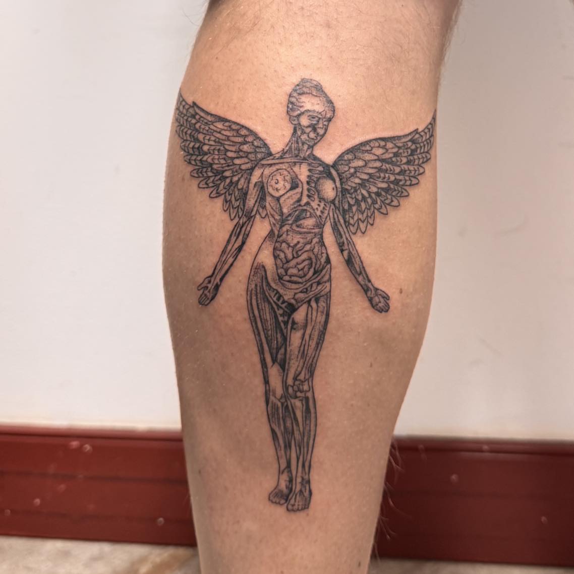 Tattoo by @juliabodyart — black_and_grey, realism