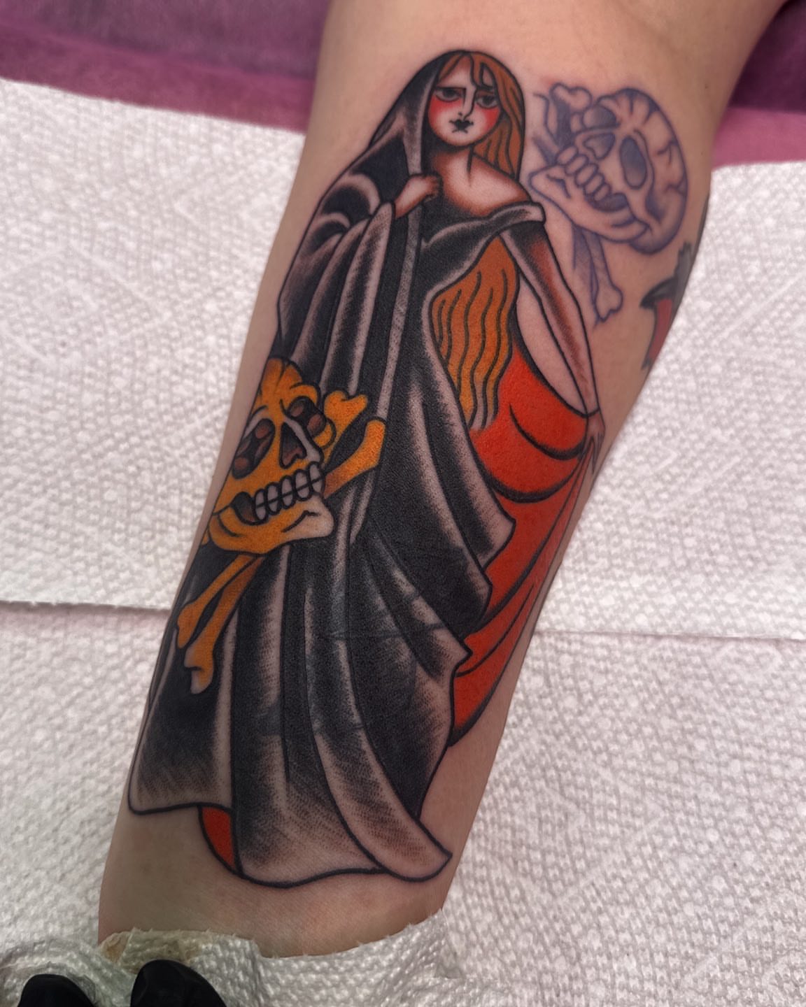 Woman with skull American traditional tattoo on the forearm by Tannis - Traditional Tattoos in Richmond, VA, Richmond, Virginia