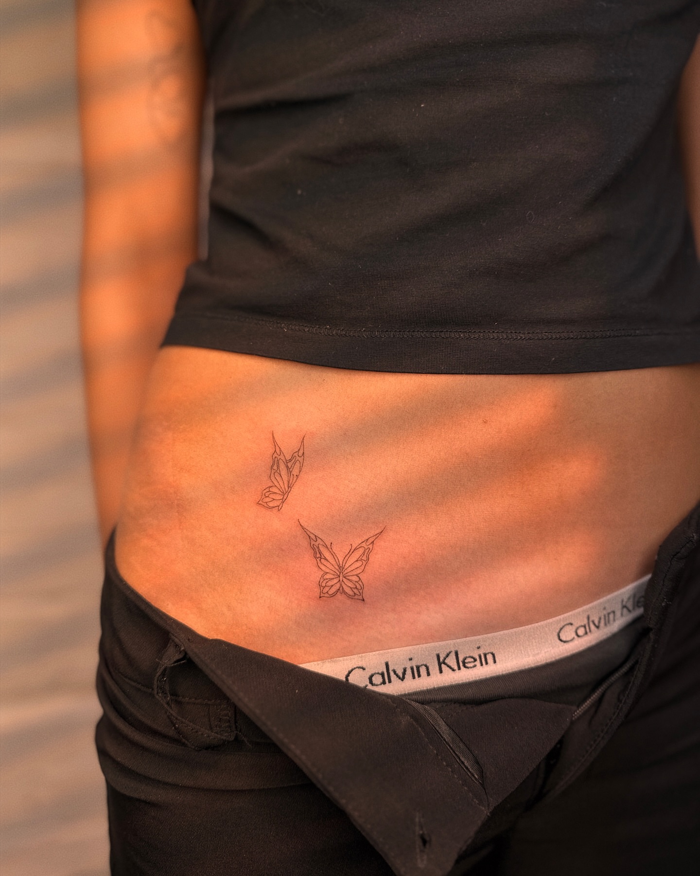 Butterflies fine line tattoo by Ellie