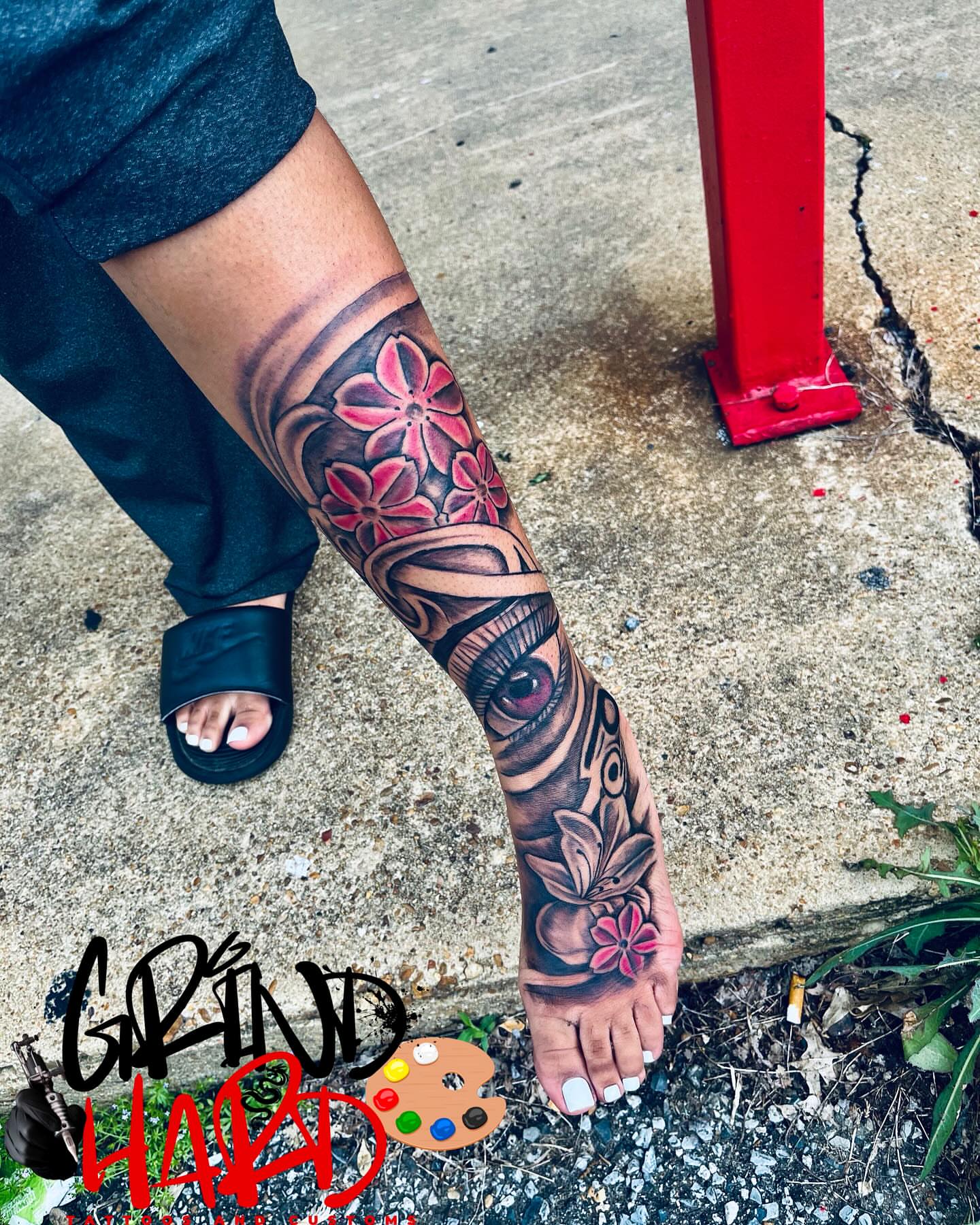 Eye and floral realism tattoo on the foot by GrindHard Quen