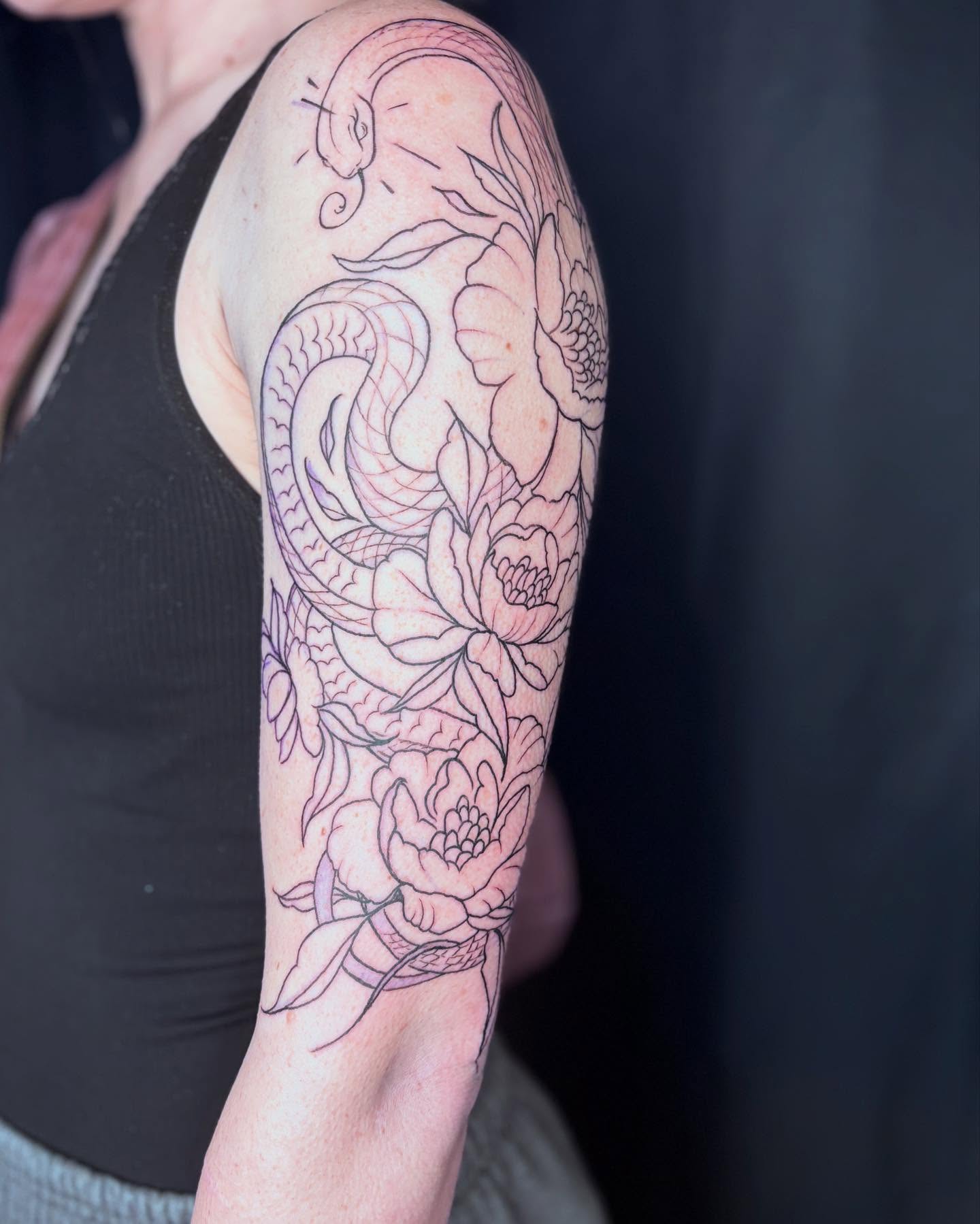 Snake and flowers black and grey tattoo on the forearm by π»πΈπ½π½, Ypsilanti, Michigan