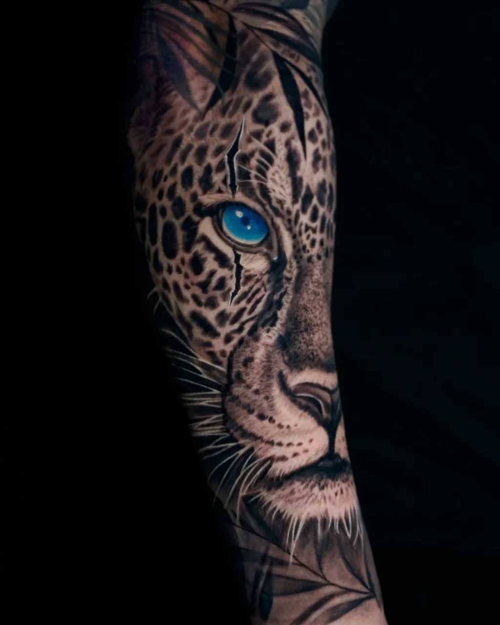Leopard realism tattoo on the forearm by Amilia Gullotta