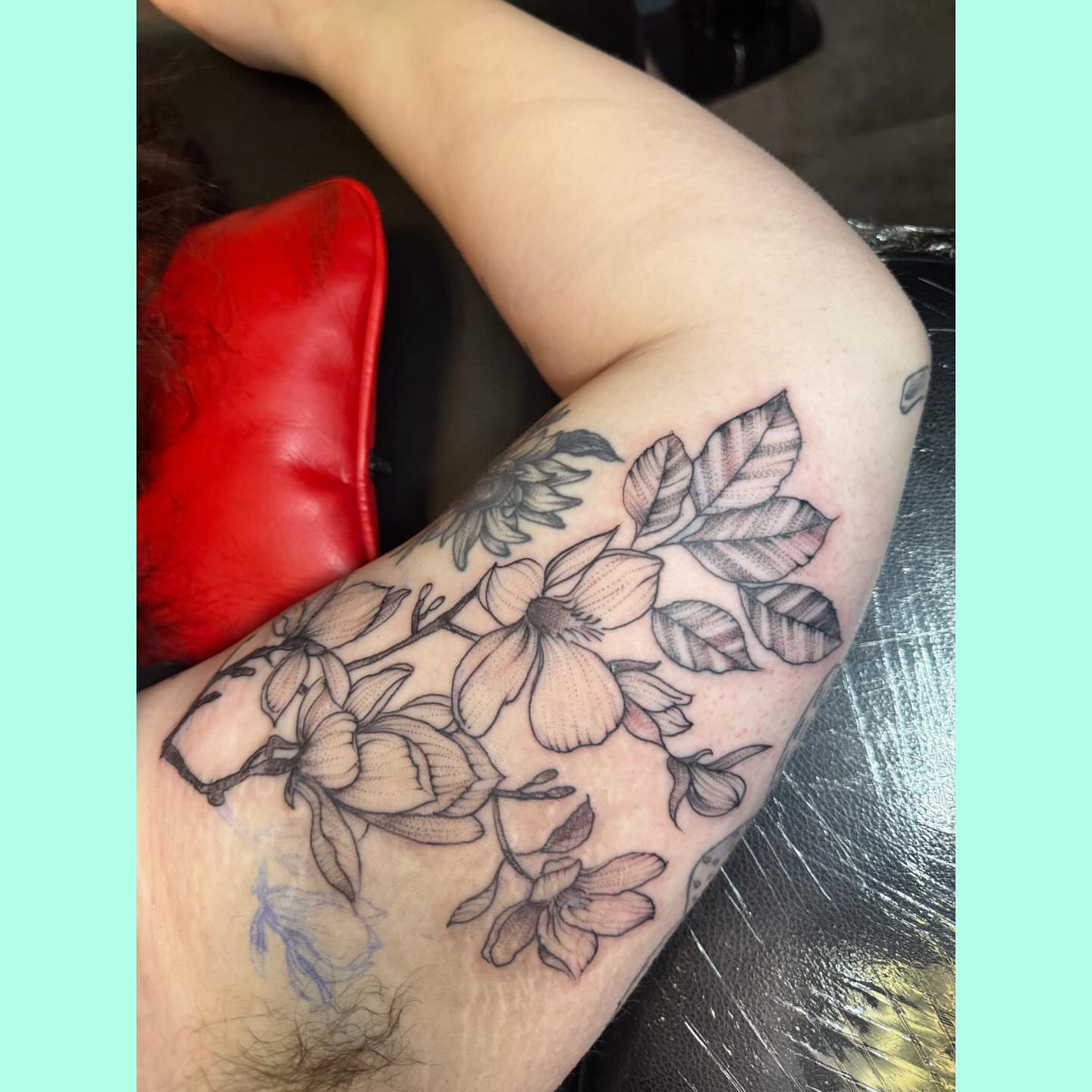 Magnolia flowers black and grey tattoo on the forearm by 𝗞𝗮𝘁 𝗕𝗹𝗮𝗻𝗸𝗲𝗻𝘀𝗵𝗶𝗽
