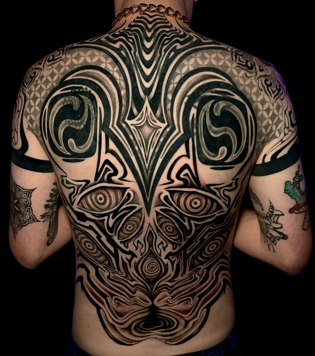 Tattoo by @inkdbydmo — blackwork, geometric