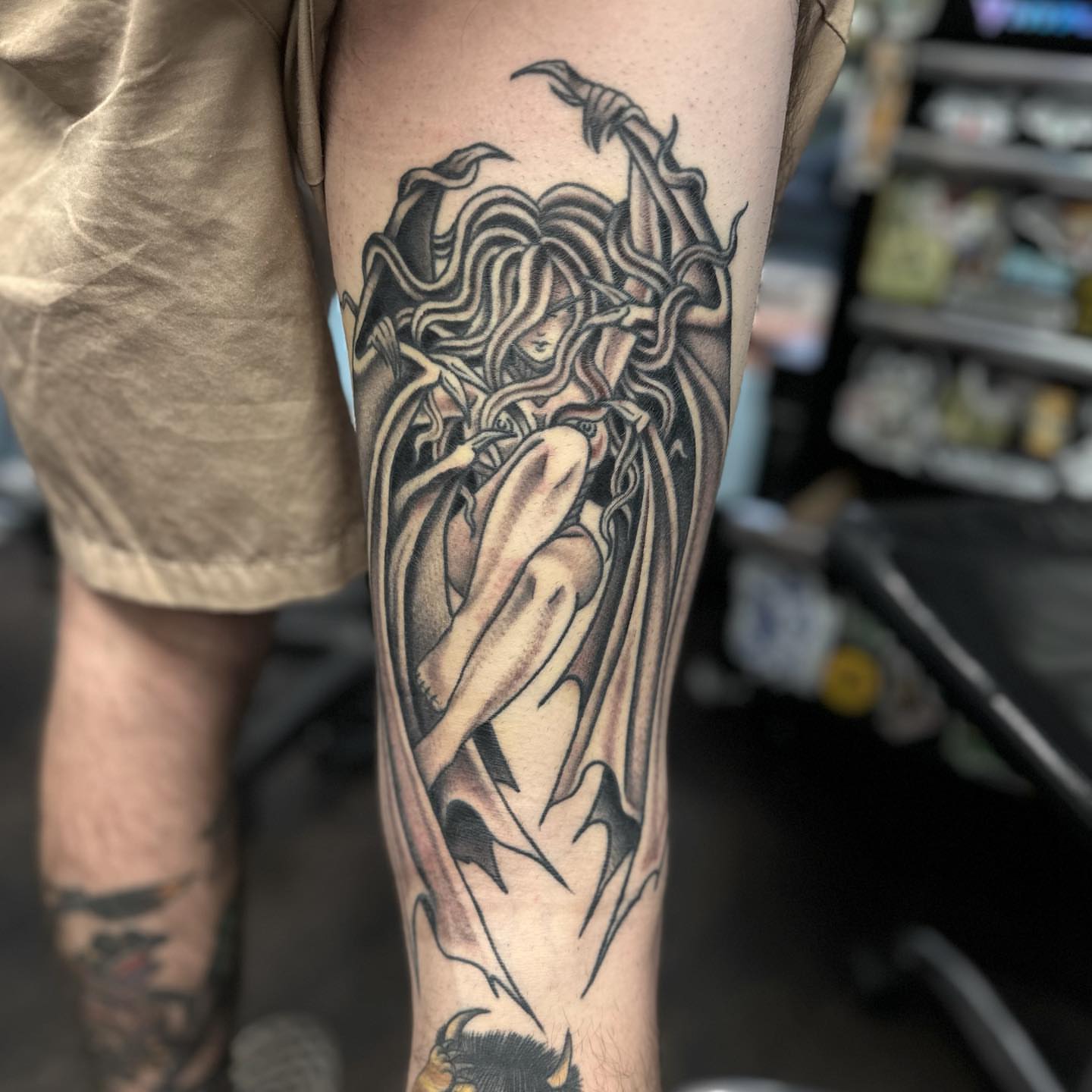 Woman with flowing hair realism tattoo on the forearm by Alexa Wolfkiel