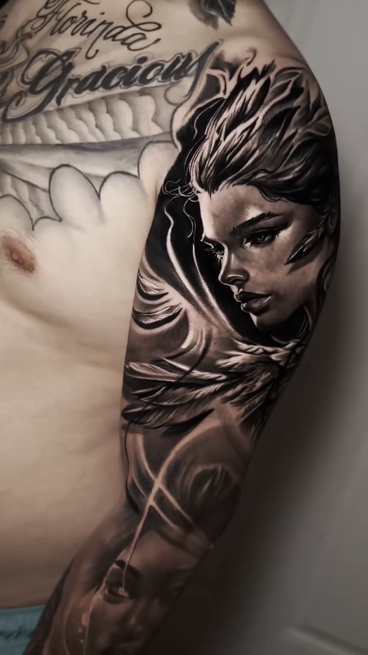 Tattoo by @tattoo_ravay — realism, black_and_grey