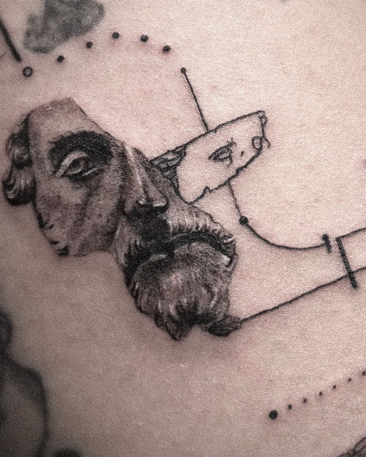 Portrait realism tattoo on the chest by Seraph Geometry