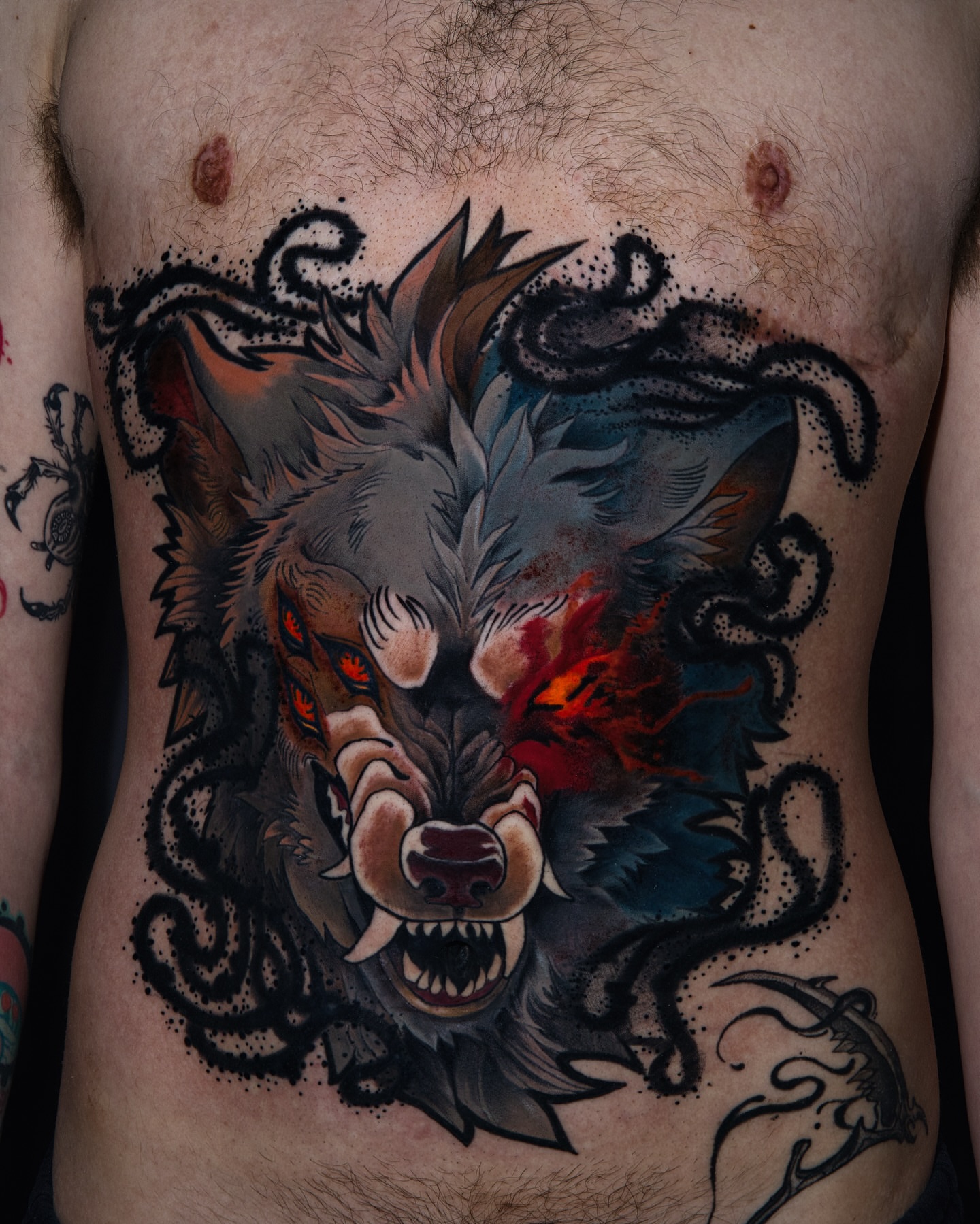 Wolf dotwork tattoo on the ribs by Igor Puente