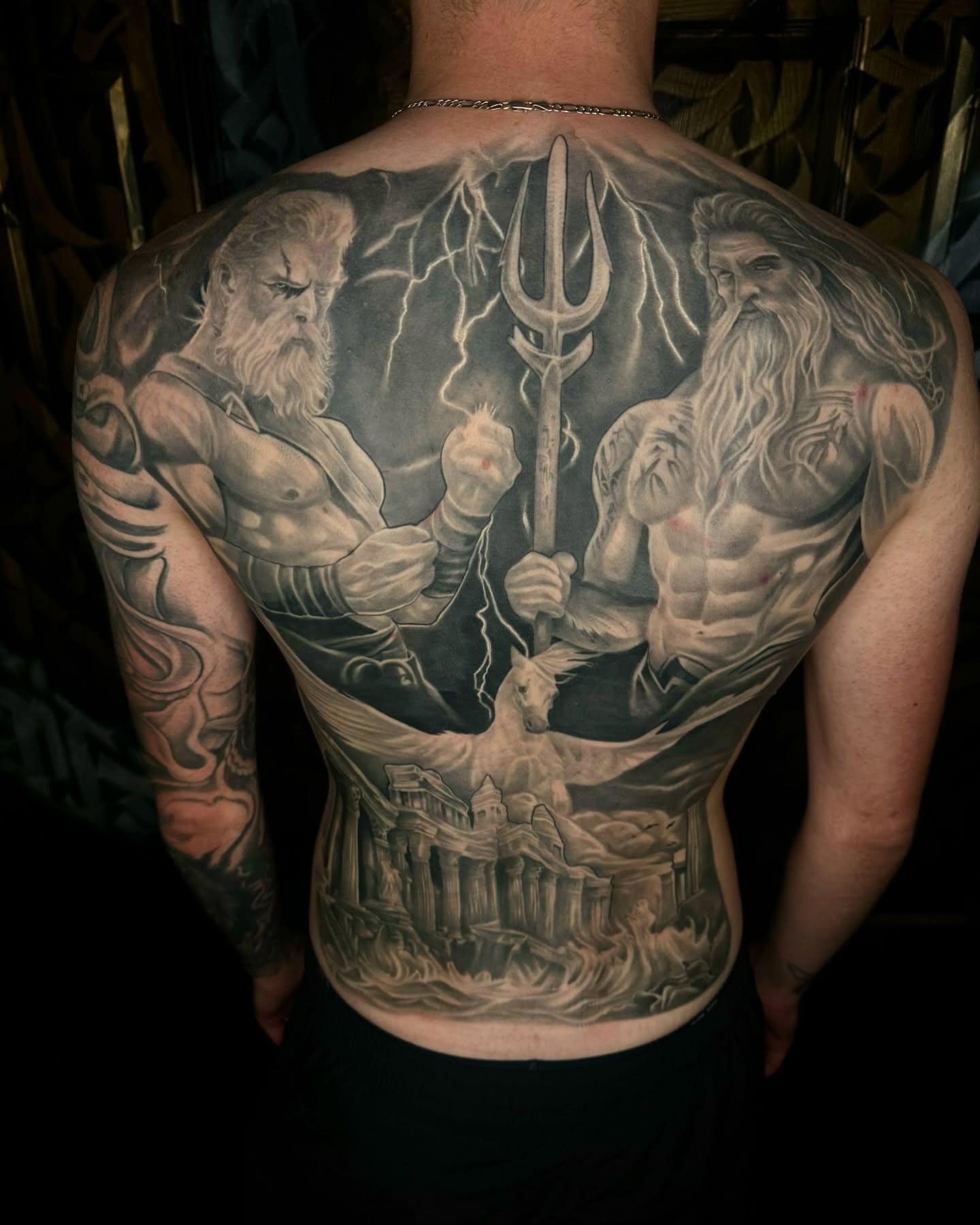 Mythological figures realism tattoo on the back by Fernando Luna