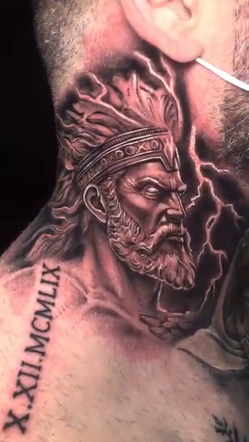 Man with headdress and lightning realism tattoo by Jose Calderon