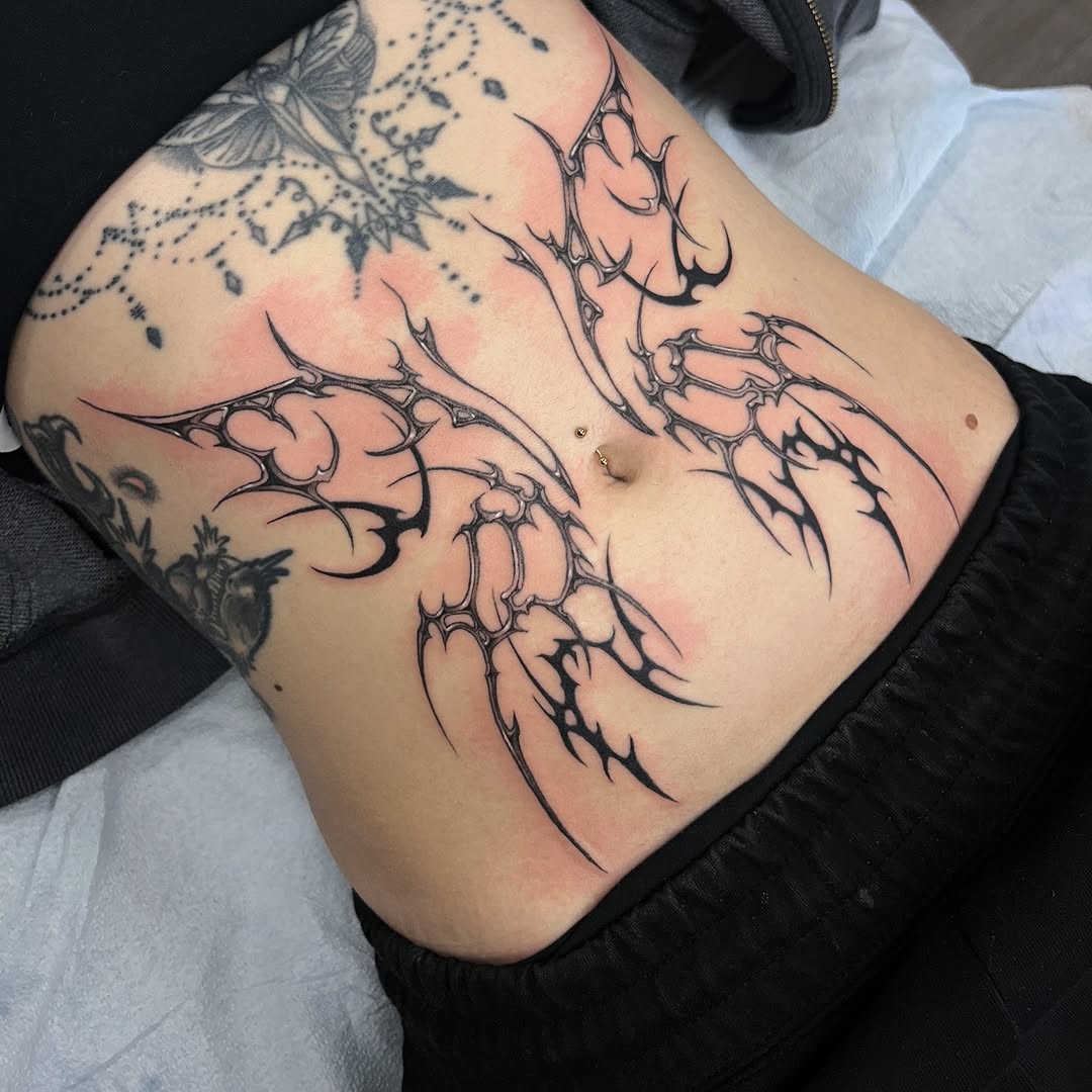 Tattoo by @deadkaylietattoo — blackwork, ornamental
