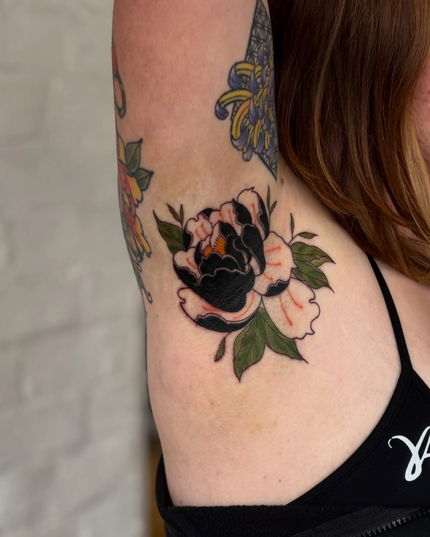 Peony American traditional tattoo on the shoulder by ✨Dani Jackson✨, New Orleans, Louisiana