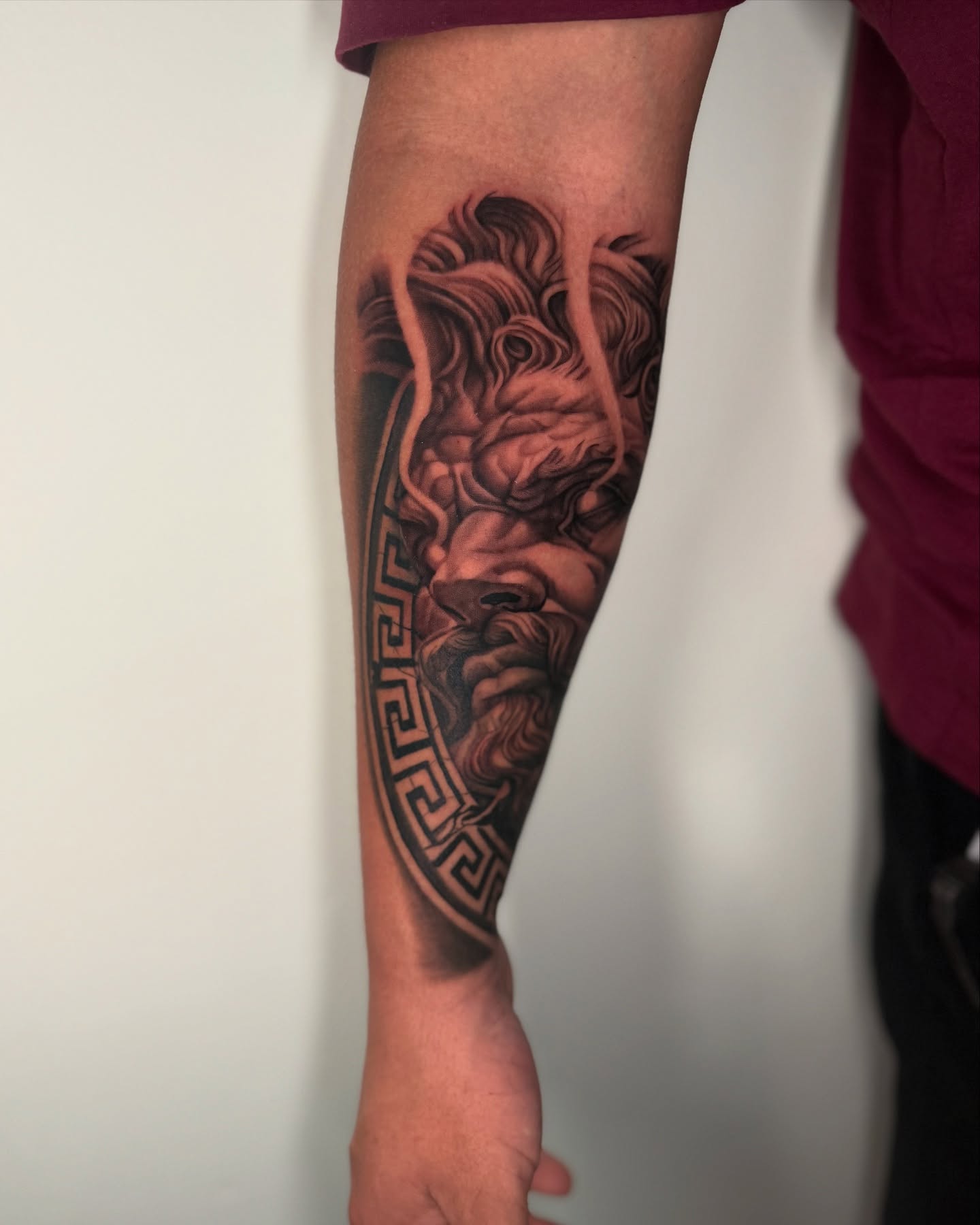 Lion realism tattoo on the forearm by Geo