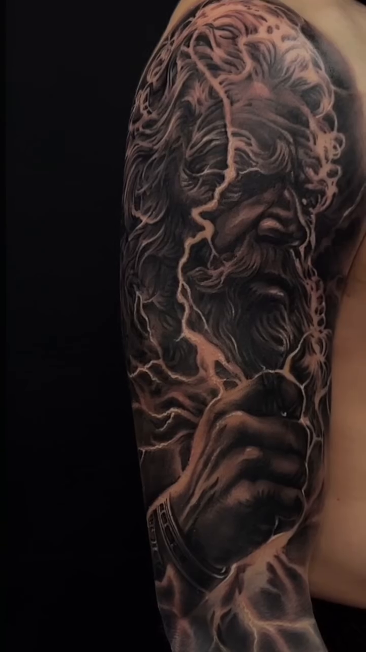 Zeus with lightning realism tattoo by @young_sely