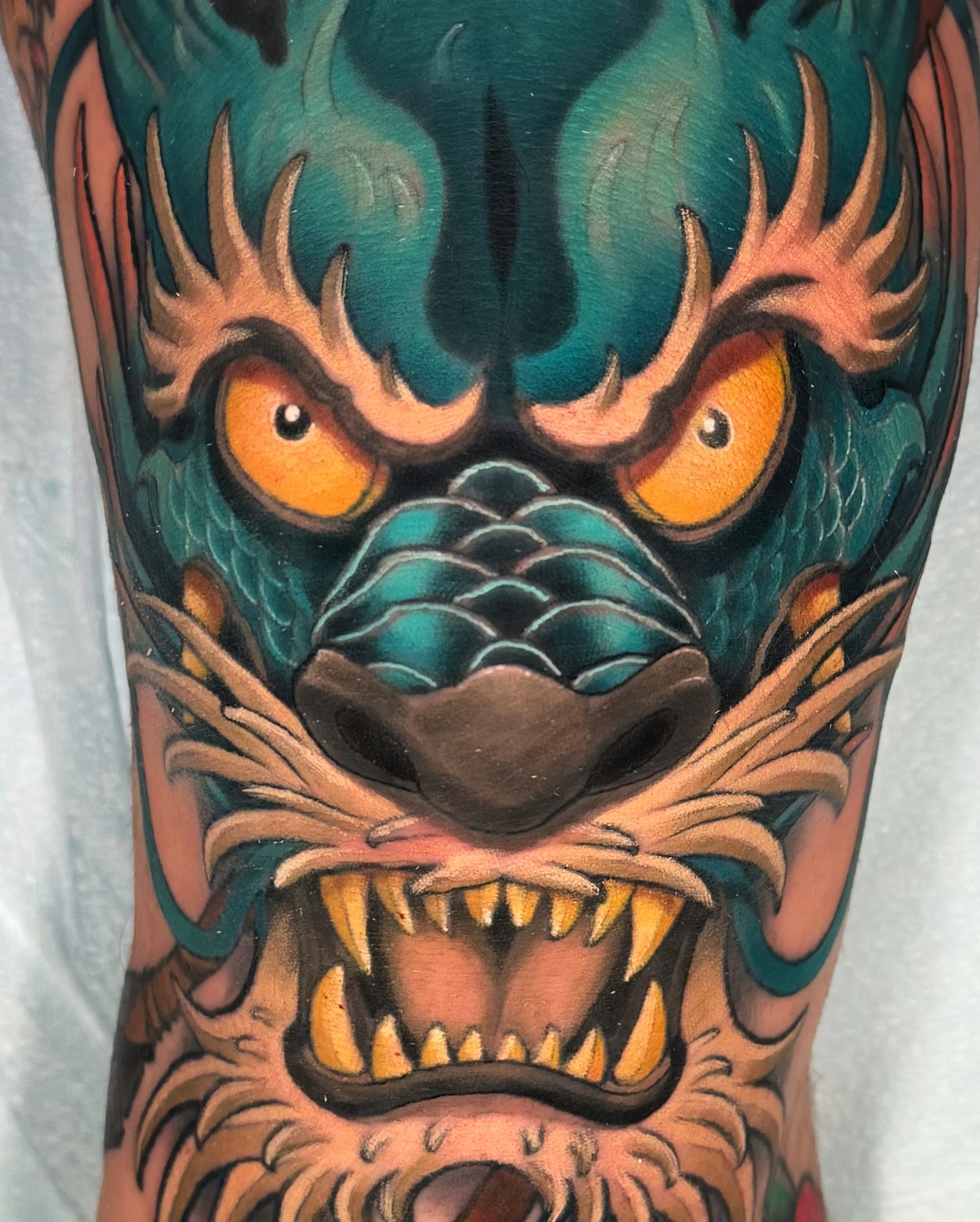 Lion American traditional tattoo on the forearm by Austin Britt
