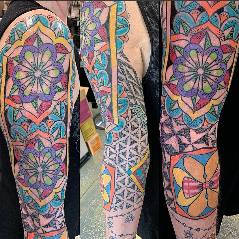 Geometric mandala dotwork tattoo on the forearm by @colorrobbie