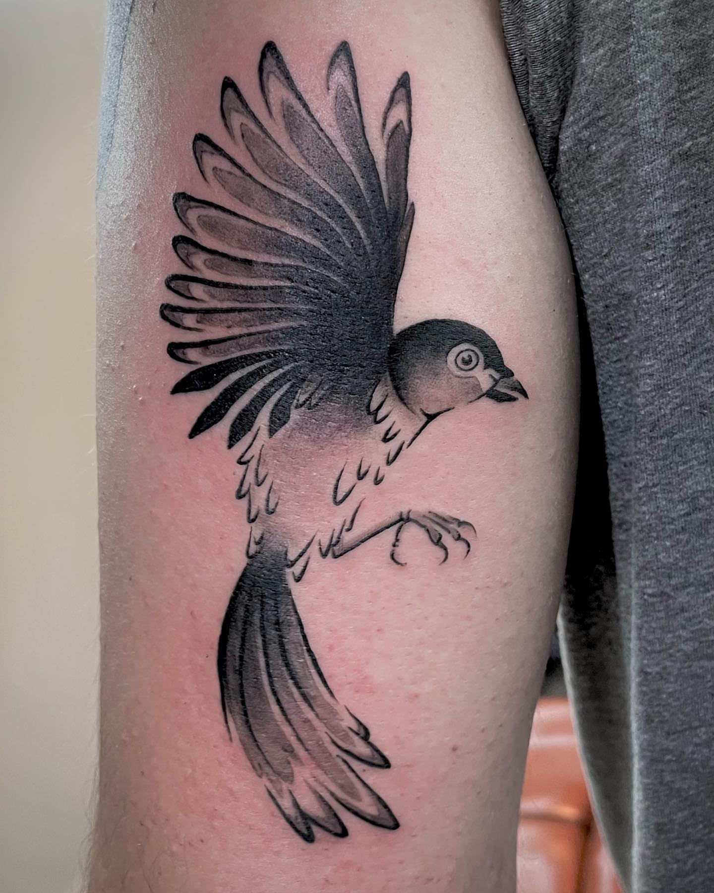 Bird black and grey tattoo on the forearm by Bryce Presley, Mission, Kansas