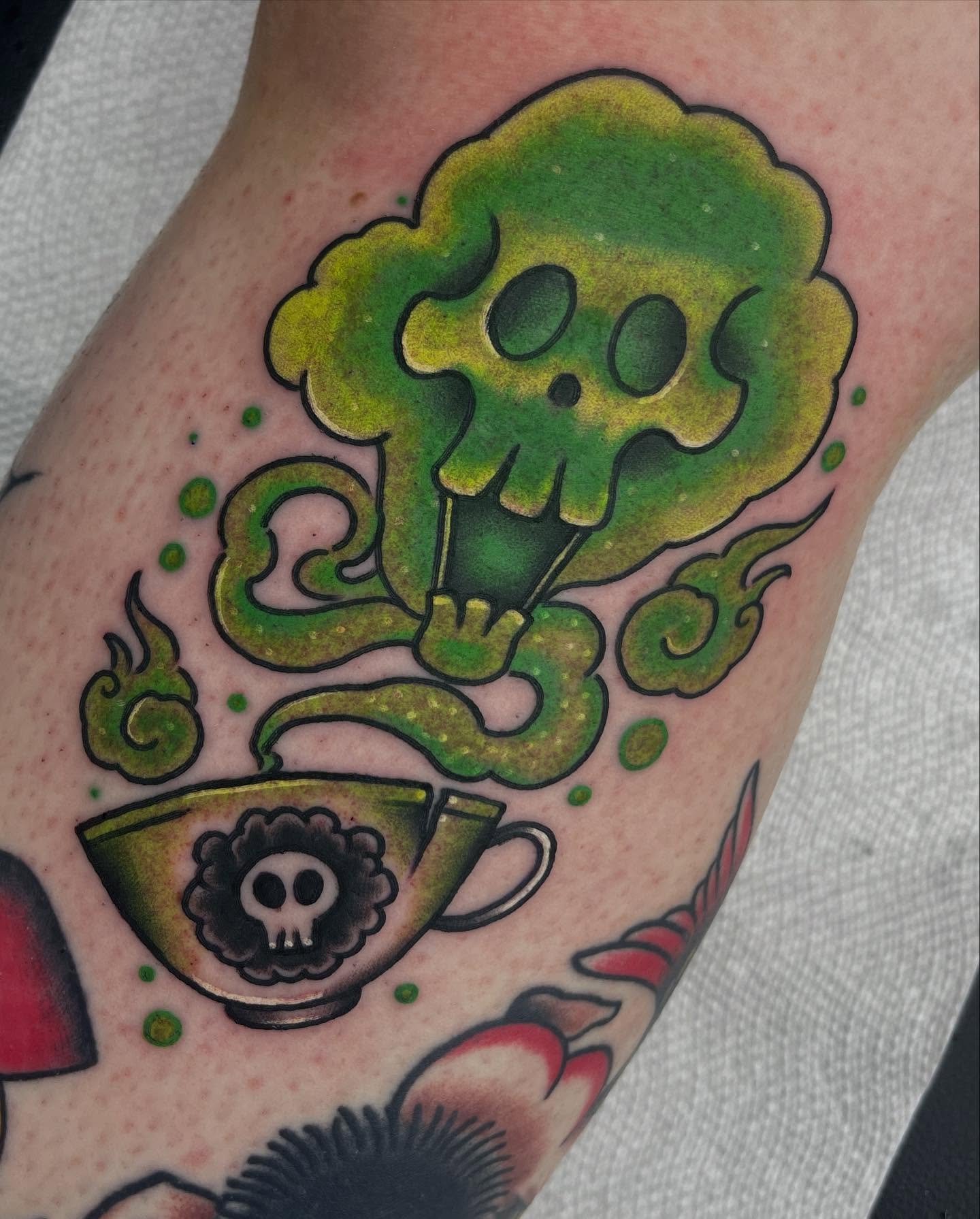 Smoke cloud and teacup new school tattoo on the forearm by Autumn Fulford