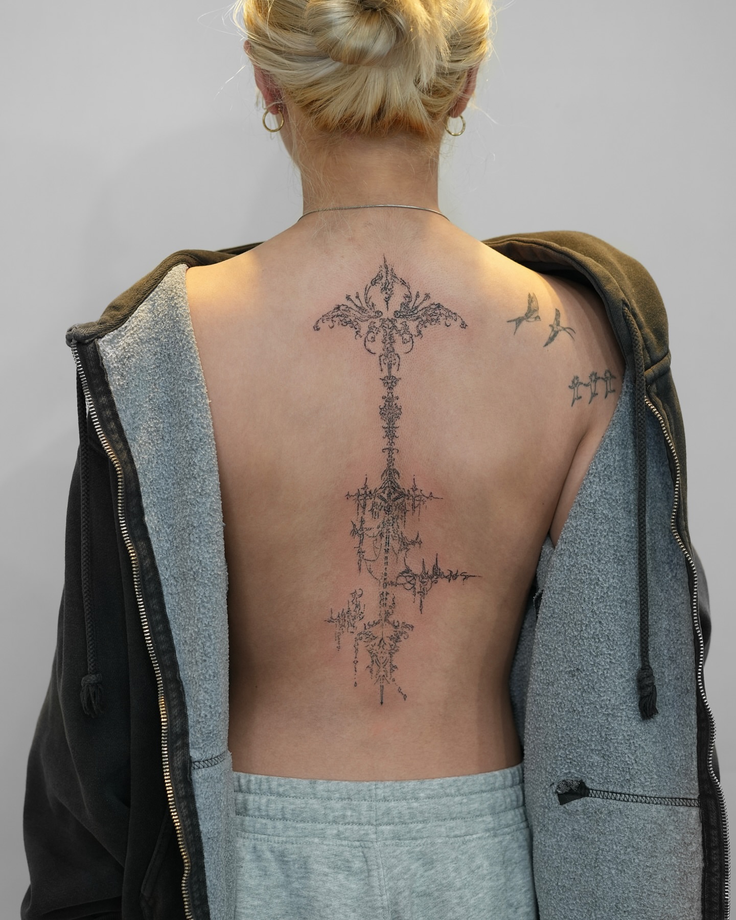 Cross black and grey tattoo on the back by alyssa ⋆₊ ♱
