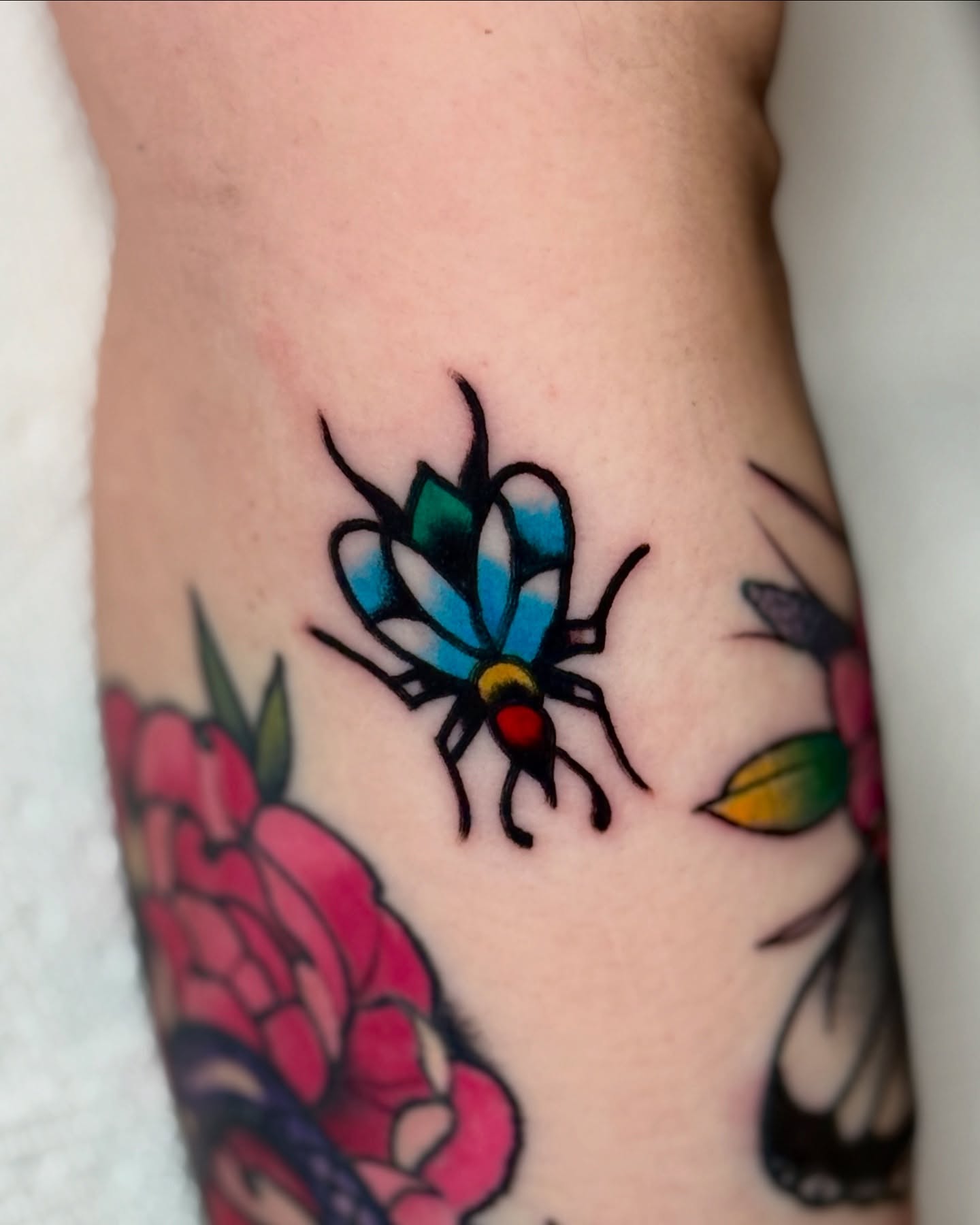 Insect American traditional tattoo on the forearm by οΌππ¨ππ¨οΌ, New York, New York