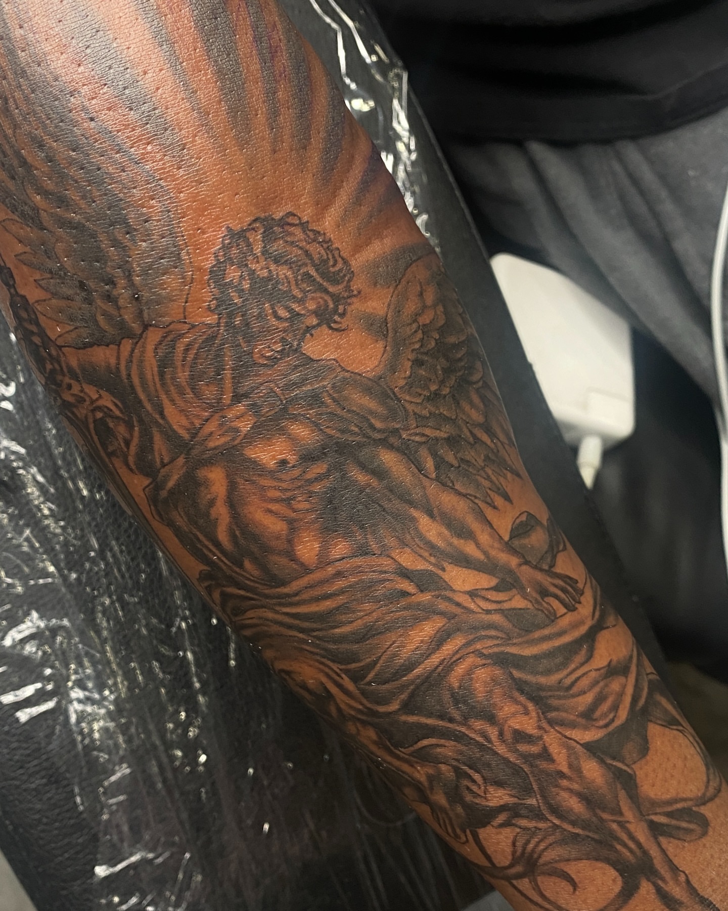 Angel realism tattoo on the forearm by Visionary🌌
