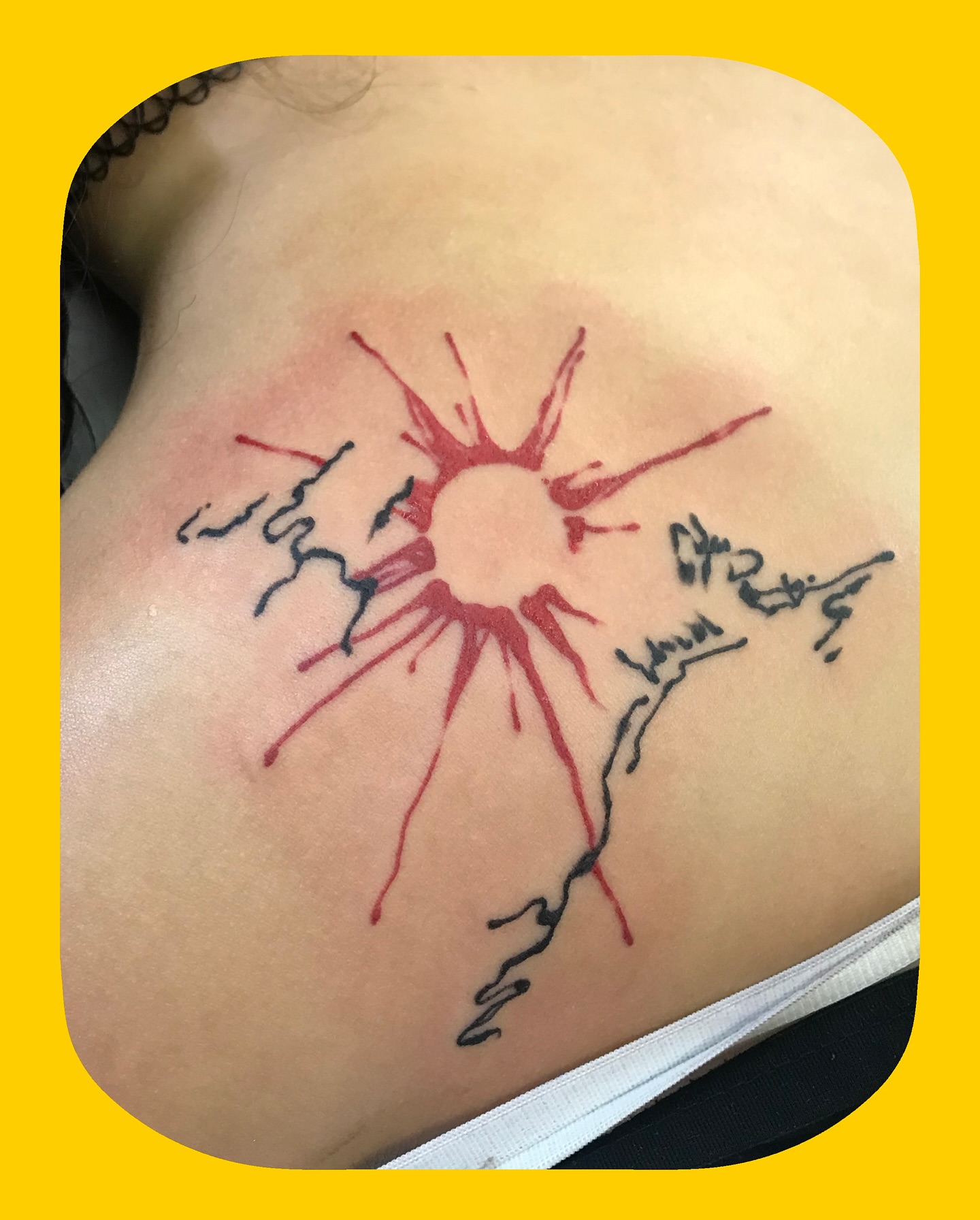Sunburst dotwork tattoo on the back by Chris Chapman