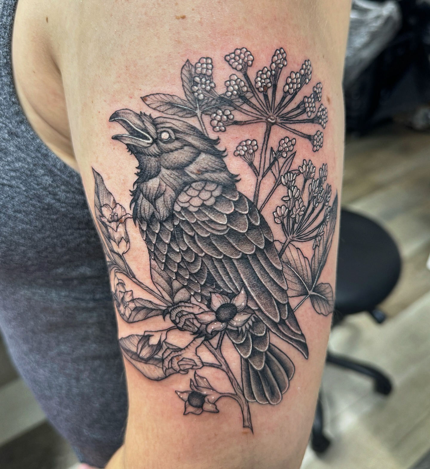 Bird and flowers realism tattoo on the forearm by Mo Dinero🎰