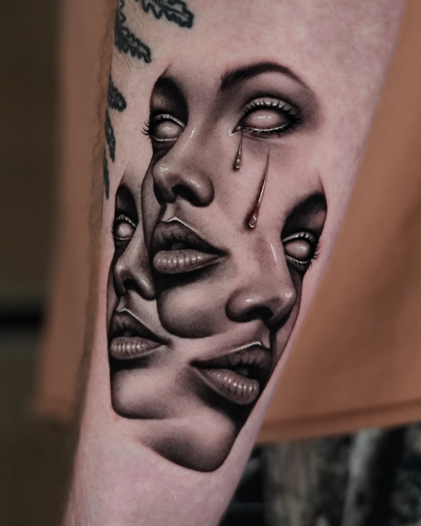 Tearful faces realism tattoo on the forearm by hiba ⊹ atlanta tattoo artist, Johns Creek, Georgia
