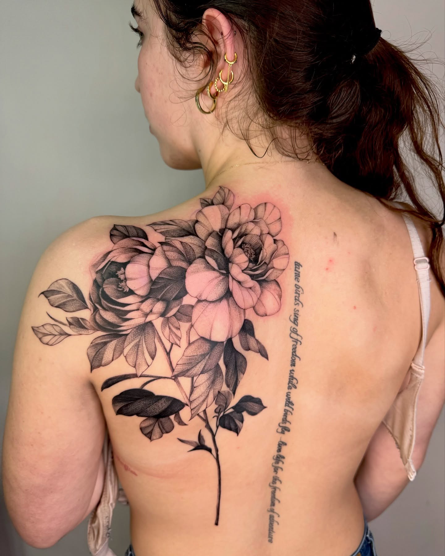 Peony flowers black and grey tattoo on the back by Ninna