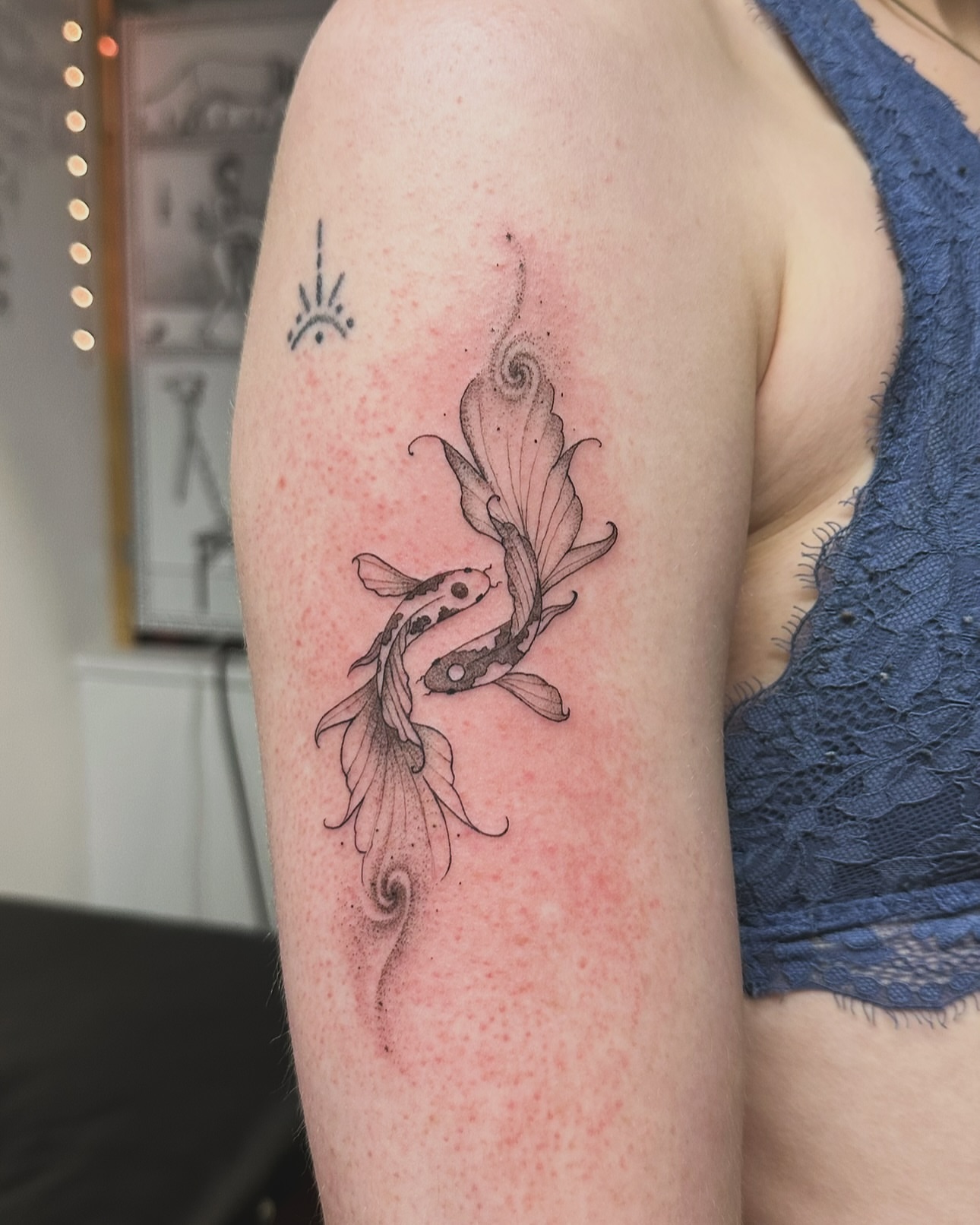 Koi fish dotwork tattoo on the forearm by Piccolino, Cambridge, Massachusetts