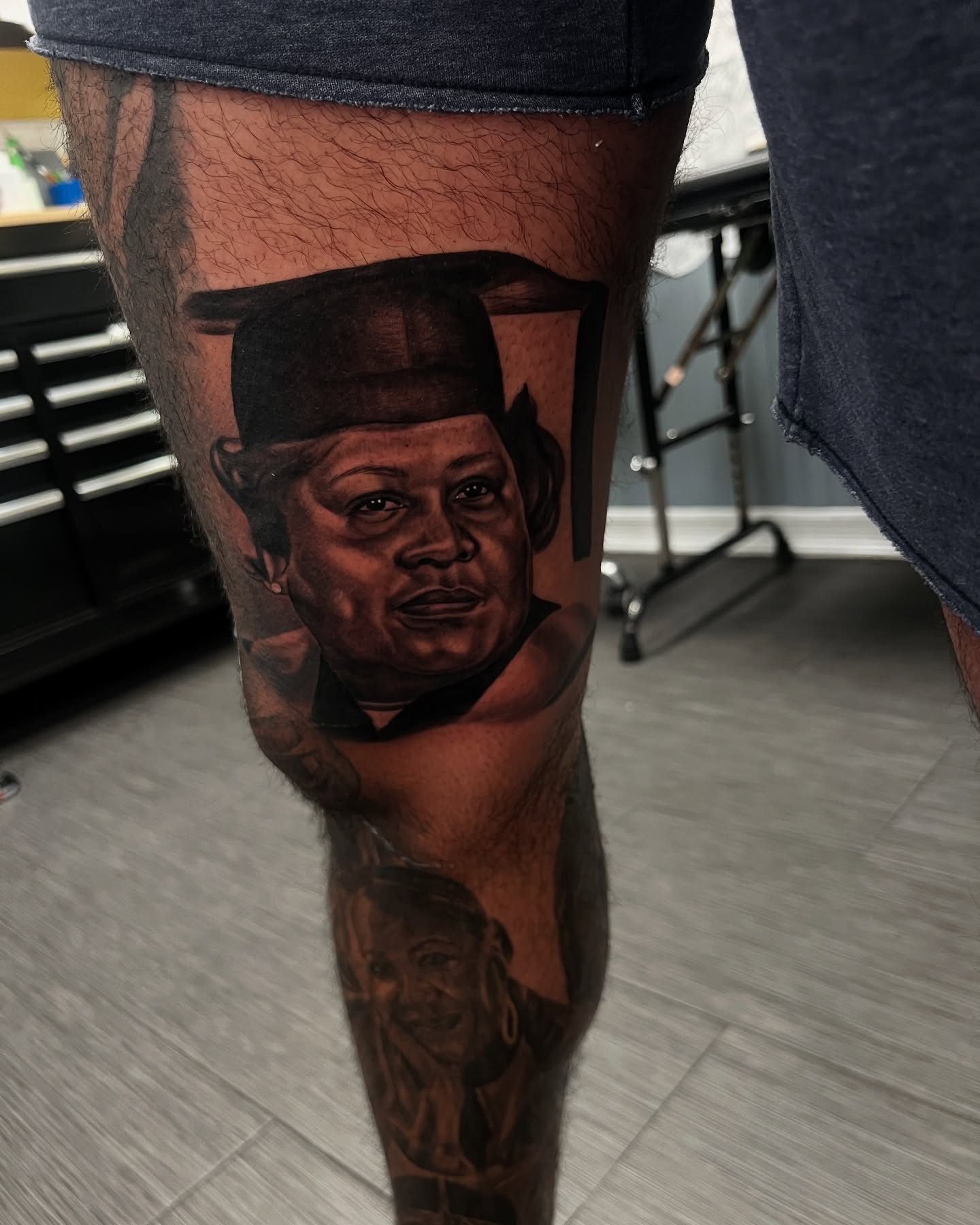 Portrait realism tattoo on the leg by Vondrae